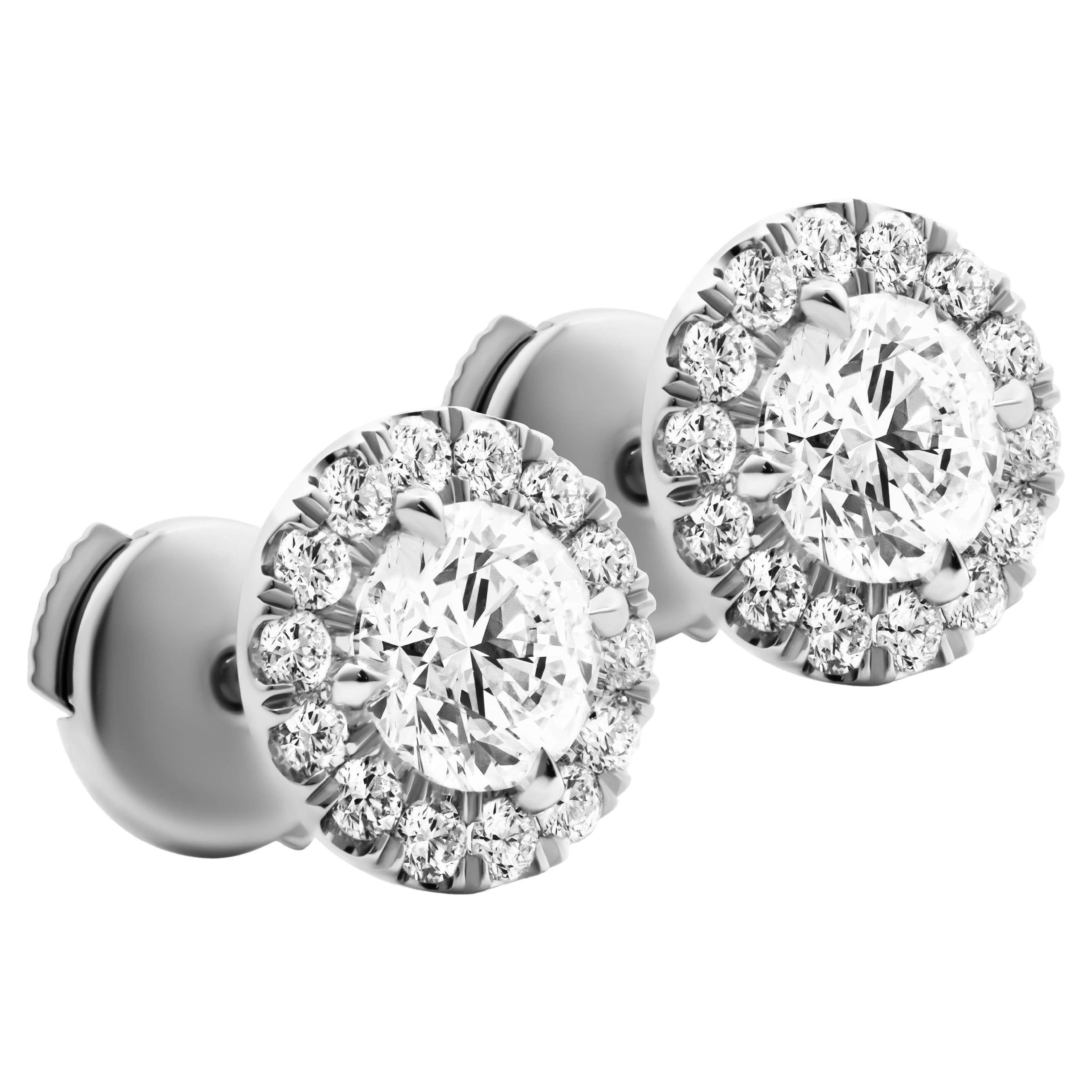 GIA Certified Classic halo studs in Platinum