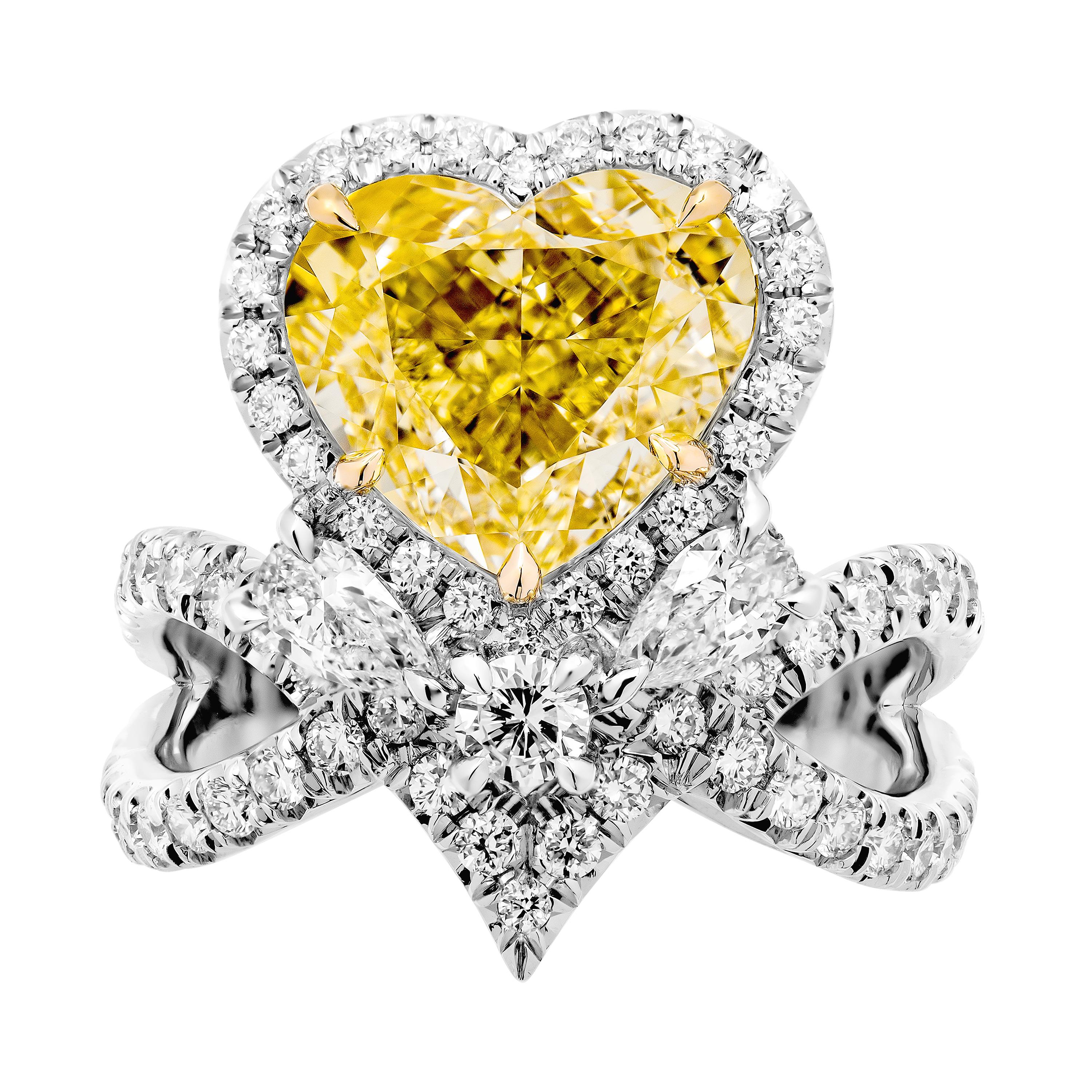 Unique and Rare!
Designed and custom made by M&V Vanguard Jewelry in 2020, Ring features Diamond Double twisted shank, Fancy gallery Under the center stone , specifically designed to highlight a beauty of Fancy Light Yellow Diamond.
Under gallery
