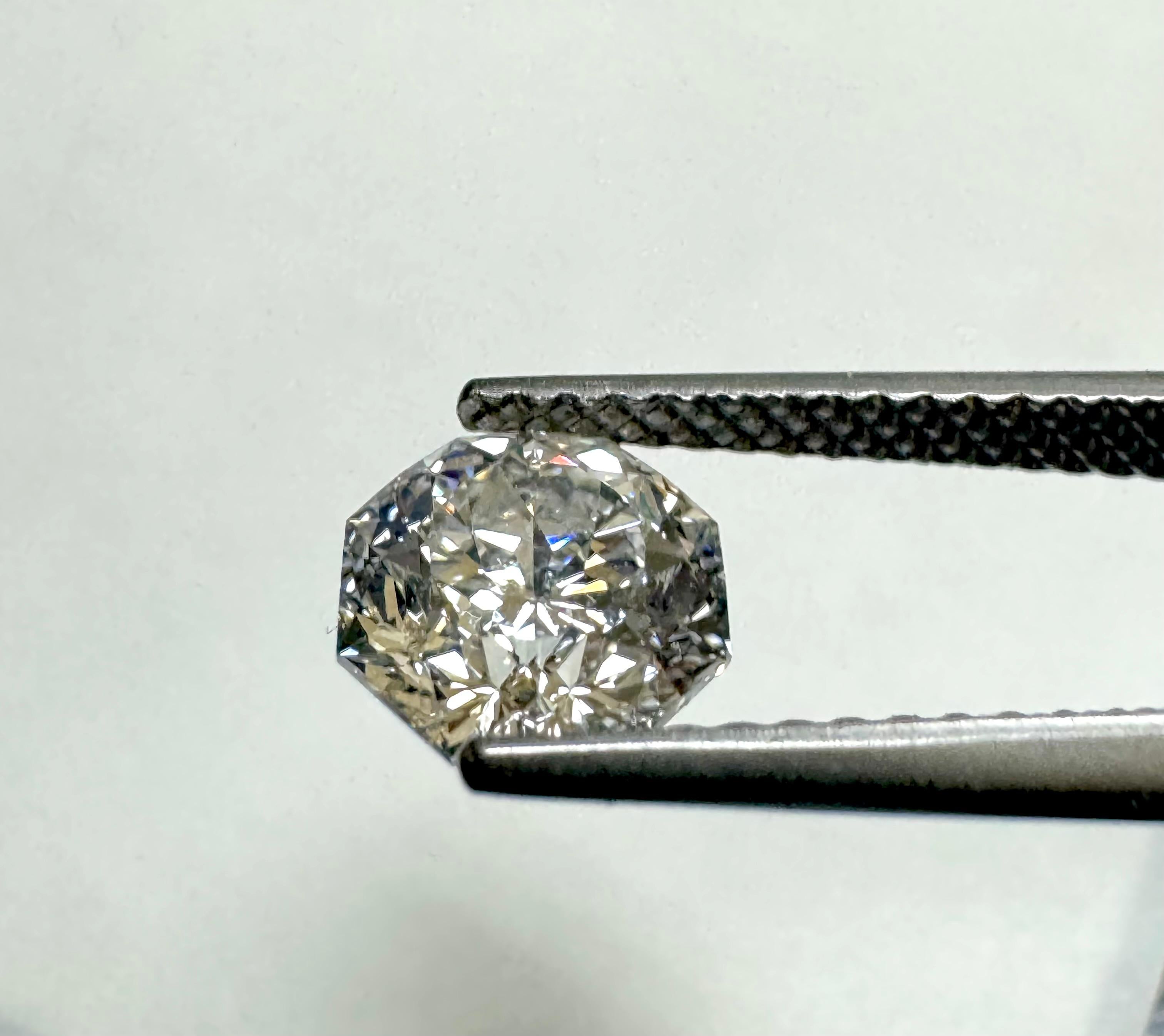 GIA Certified Diamond

Shape-Octagonal Modified Brilliant 

Carat Weight- 1.26

Color- E-

Clarity- VS1

LASER INSCRIBED DIAMOND

Certificate Number- 6234337544

ONE OF A KIND Superior Cut Hearts and Arrows Octagonal Modified Brilliant Diamond With