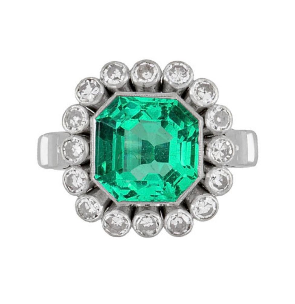 Antique Art-Deco, GIA-Certified 18K White Gold Colombian Emerald, and Diamond Ring & Earrings Set

This stunning antique 18K white gold emerald and diamond set features GIA-certified Colombian emeralds with exceptional color and clarity. The