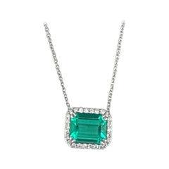 GIA Certified Colombian Emerald and Diamond Halo Pendant Necklace