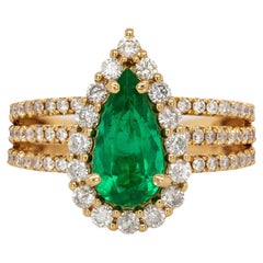 Bague en or massif 18 carats ornée d'une émeraude colombienne certifiée GIA et d'un diamant naturel