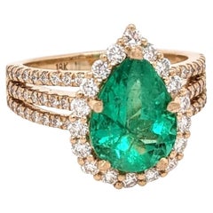 GIA Certified Colombian Emerald Ring with Earth Mined Diamonds: Solid 18K Gold