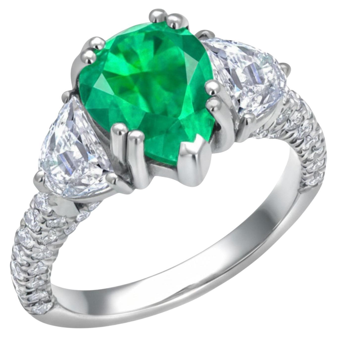 Bague en or 18 carats avec diamants et émeraude de Colombie poire certifiée GIA de 3,35 carats en vente