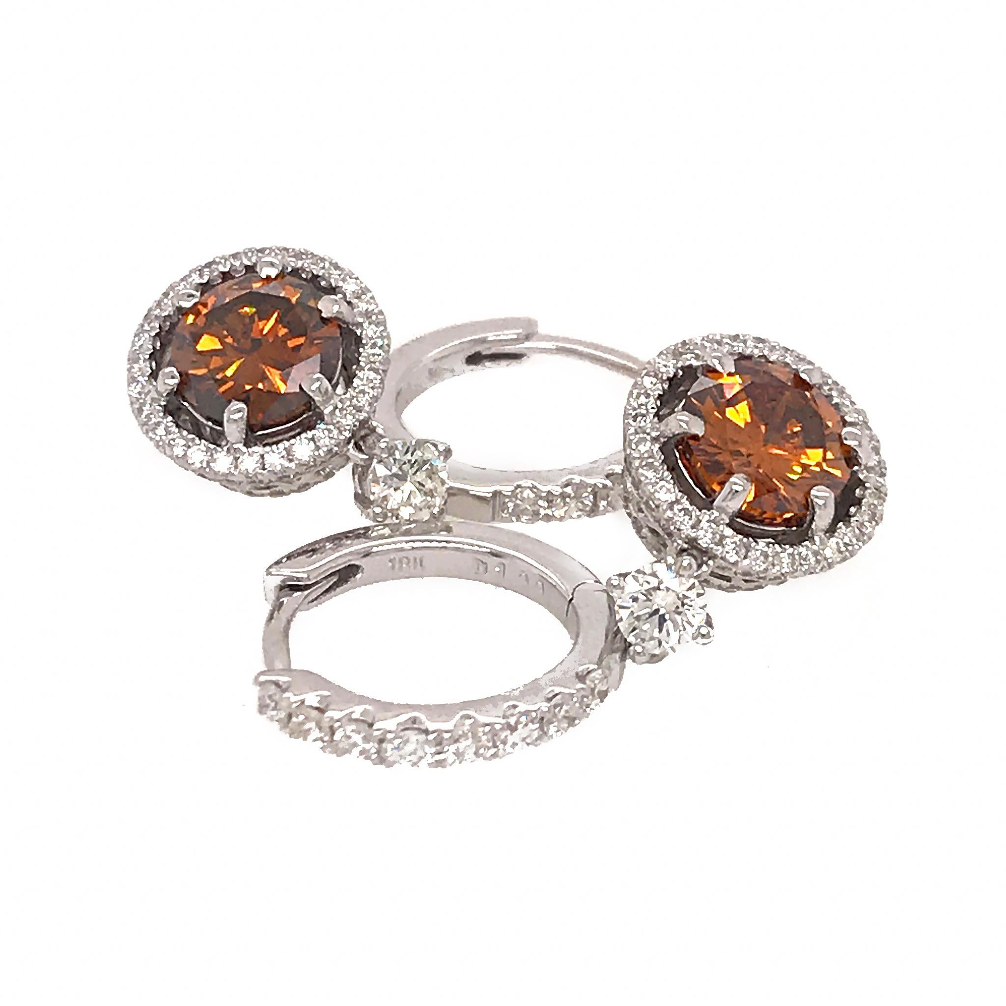 18k White Gold
GIA Report Number: 5202971977 and 2205972019
Round Brilliant Cognac Colored Diamond: 1.65 ct twd (Treated)
Diamond: 2.65 ct twd
Length: 1 inch