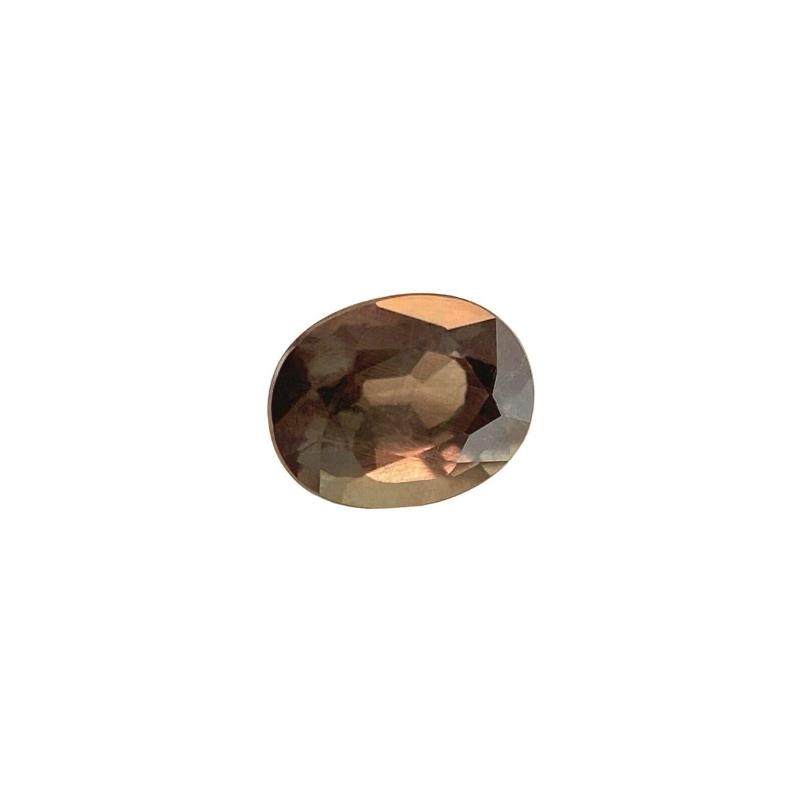 GIA Certificado Color Cambio Granate 0.88ct Piropo Espessartina Talla Oval Gema Rara en venta 7