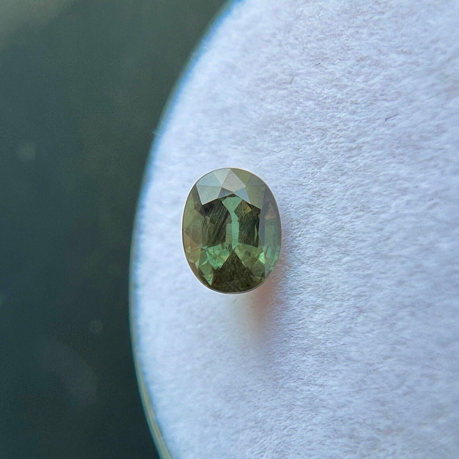 GIA Certificado Color Cambio Granate 0.88ct Piropo Espessartina Talla Oval Gema Rara en venta 1