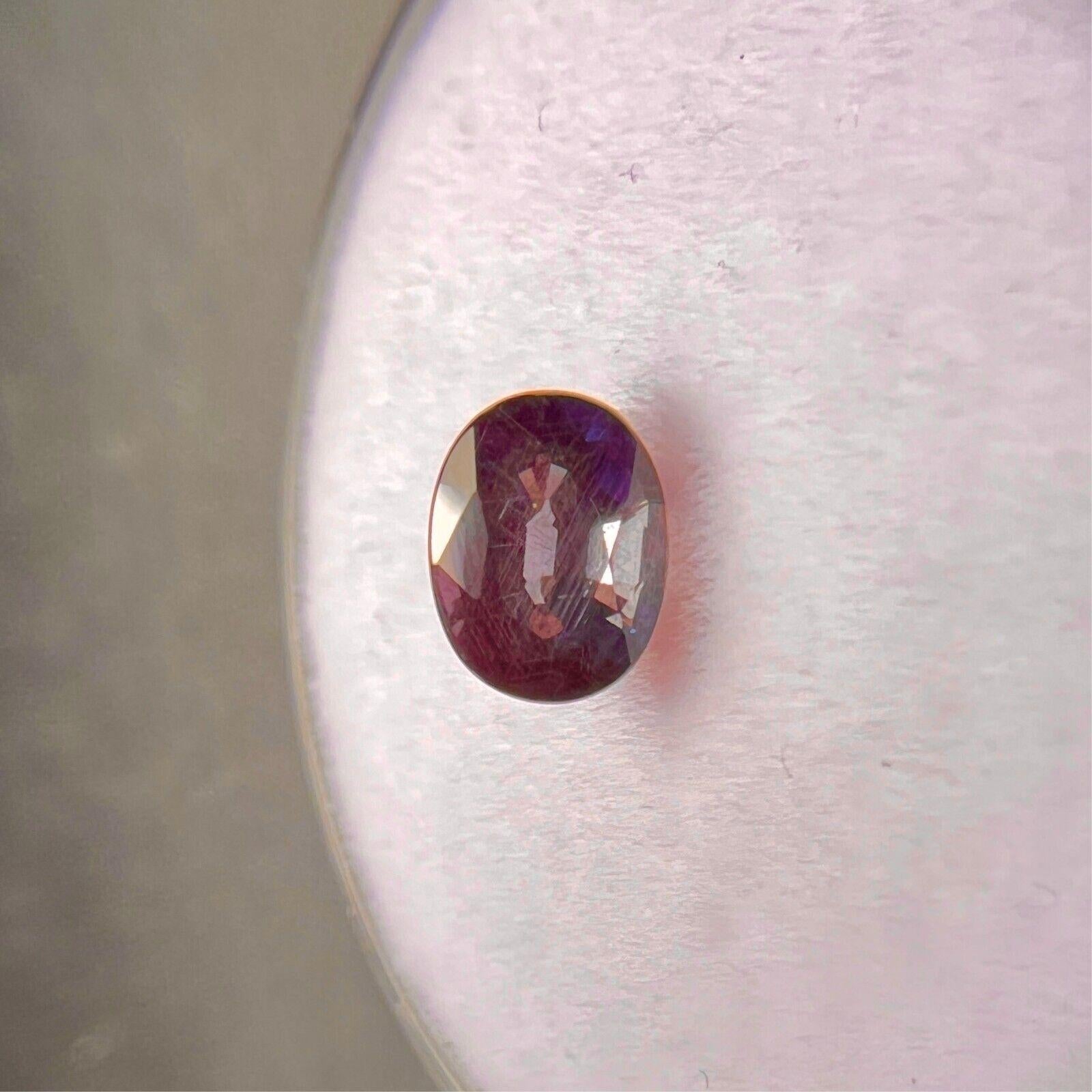 GIA Certificado Color Cambio Granate 0.88ct Piropo Espessartina Talla Oval Gema Rara en venta 2