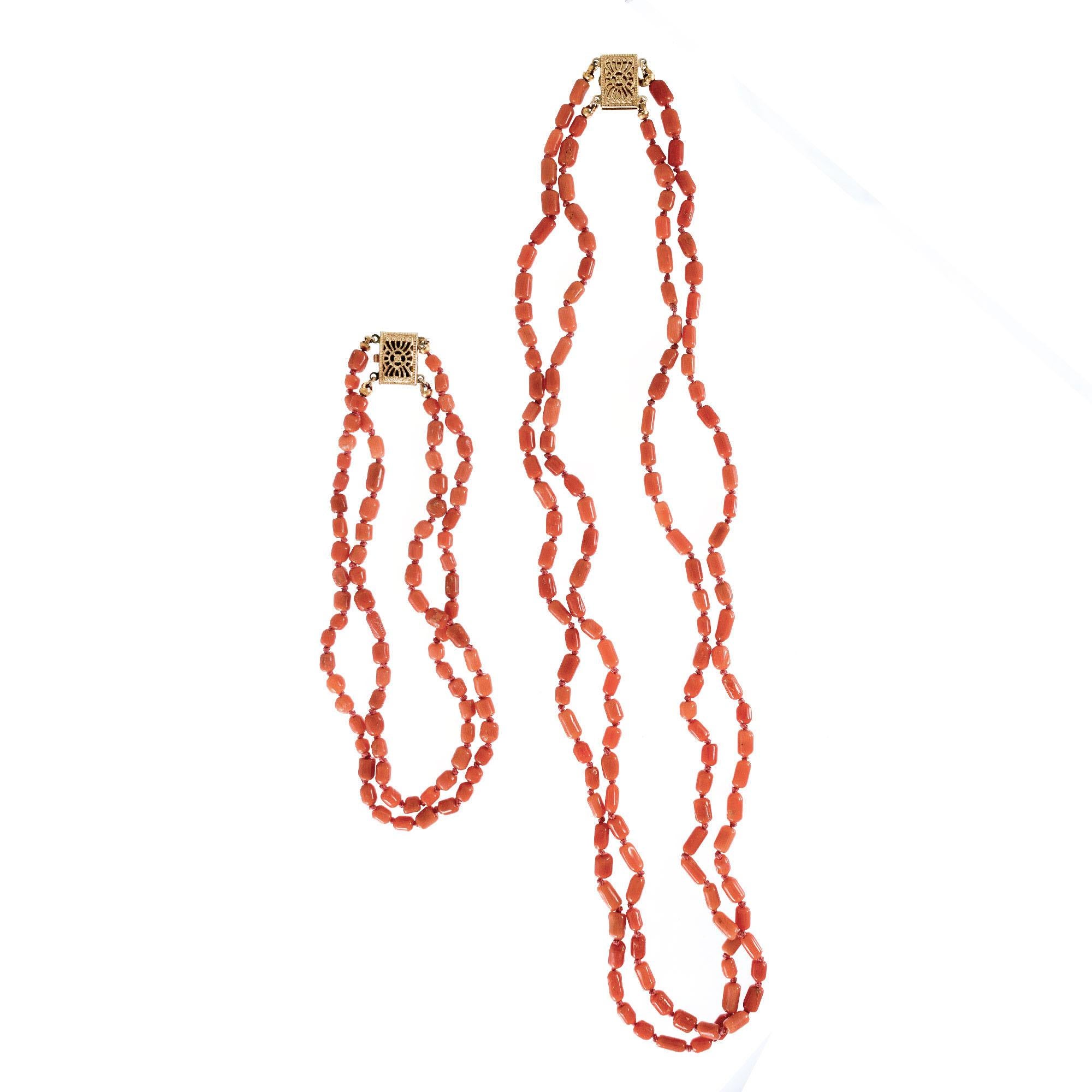 Natural untreated coral GIA certified 16.5 matching two strand necklace with a 9 Inch extender to make a 25.5 inch long necklace or worn as a bracelet. 

Necklace:
137 Reddish orange coral beads GIA certificate # 1182037981
Bracelet: 
81 Reddish