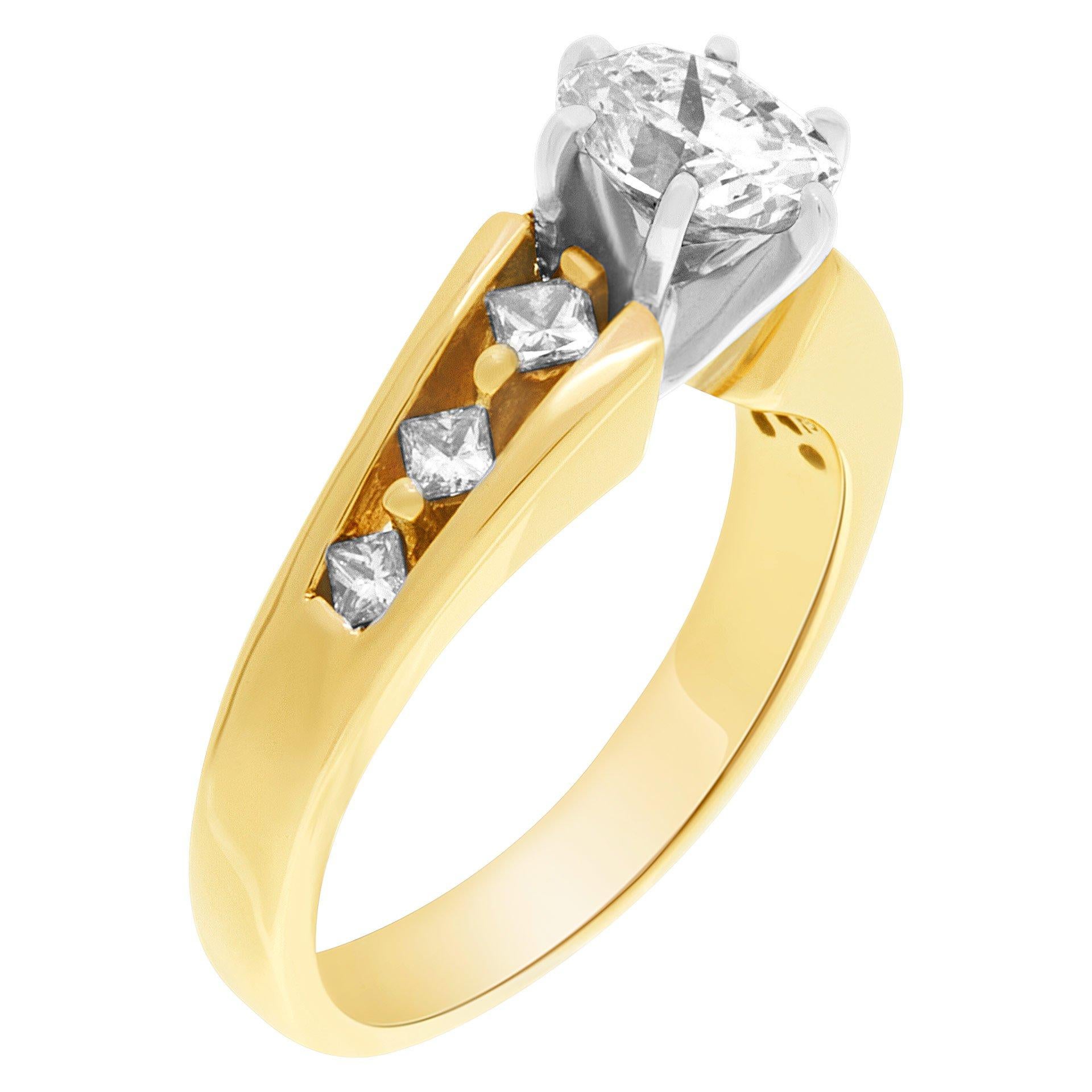 GIA certified cushion brilliant cut diamond 0.87 carat (H color, I1 clarity) set in beautiful 14k yellow gold ring with three diamonds on each side. Size 6.

This GIA certified ring is currently size 6 and some items can be sized up or down, please