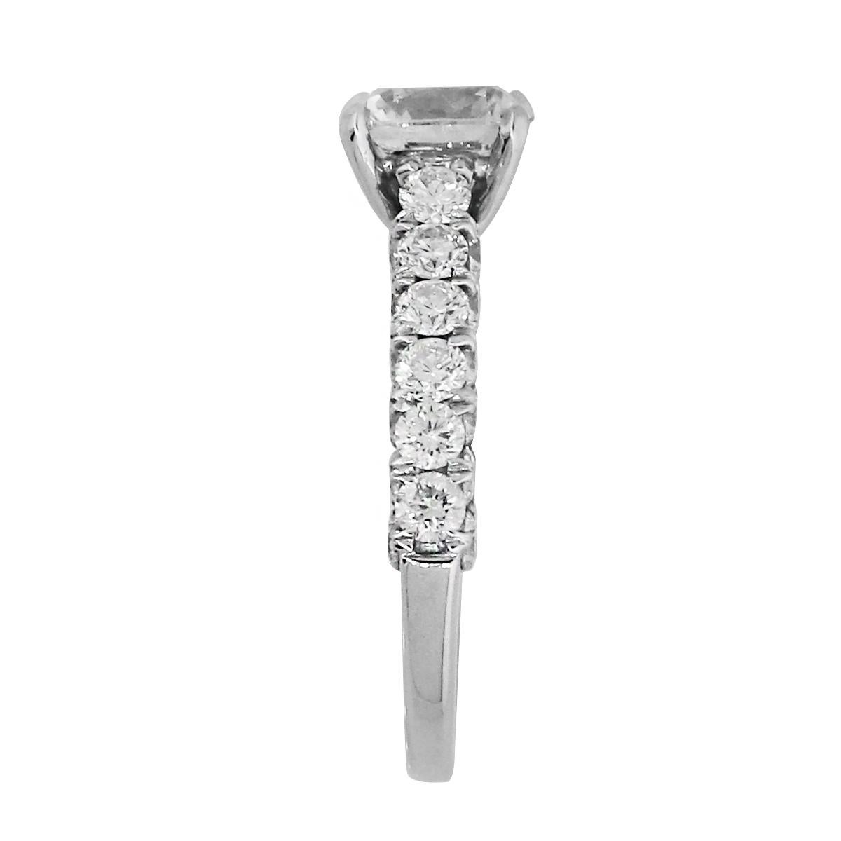 Material: 18k White Gold
Center Diamond Details: 1.51ct GIA Certified cushion cut diamond. Center diamond is I in color and VS2 in clarity. 
Accent Diamond Details: Approximately 1.70ctw round brilliant accent diamonds. Diamonds are G/H in color and