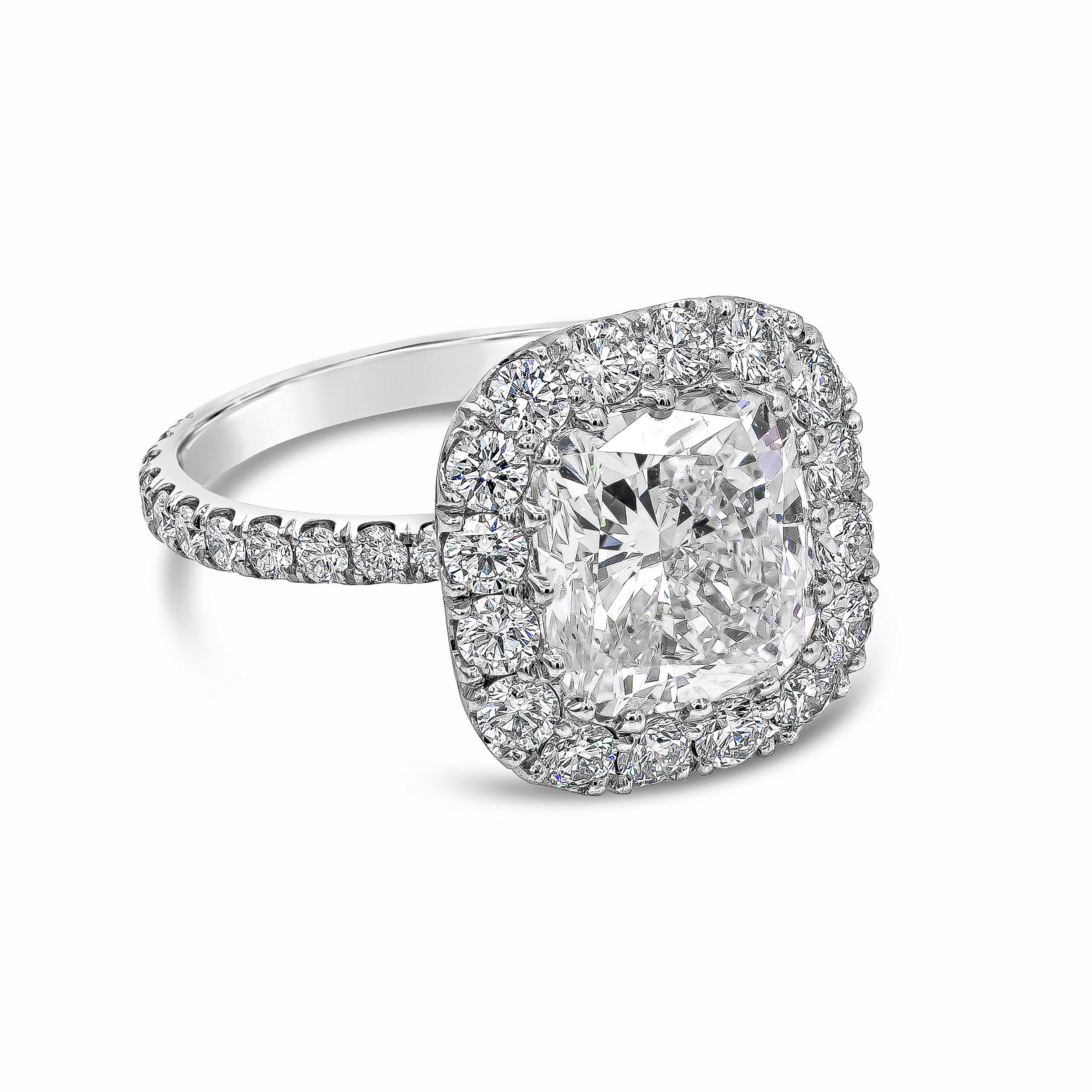 A traditional engagement ring style showcasing a 3.70 carat cushion cut diamond, embellished with a single row of round brilliant diamonds. Set in a platinum mounting set with diamonds. Accent diamonds weigh 1.43 carats total.

GIA G-SI2

Style