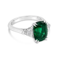 GIA Certified 3.76 Cushion Cut Emerald and Diamond Three-Stone Engagement Ring