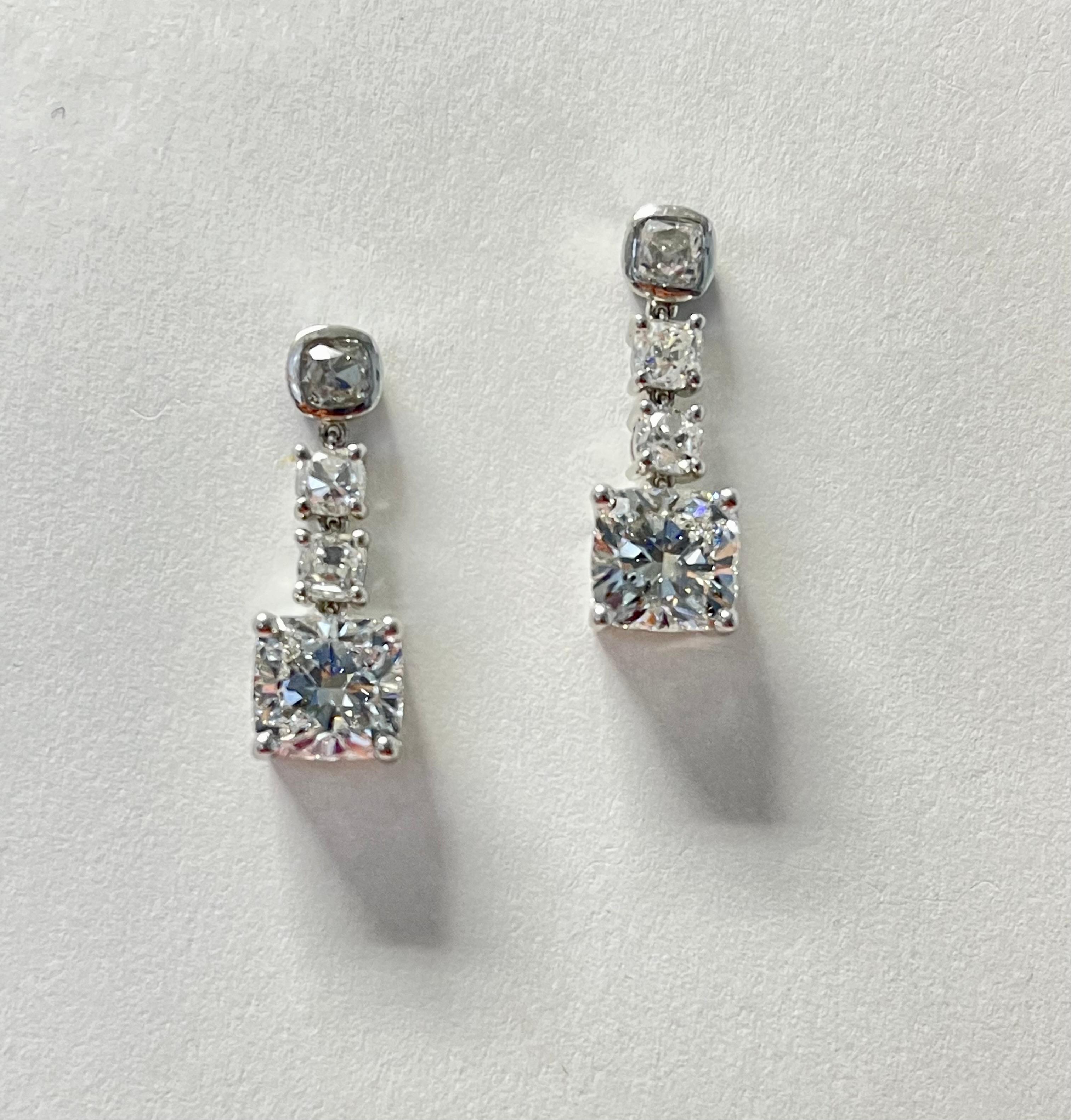 Women's GIA Certified Cushion Diamond Three Stone Dangle Earrings In Platinum. For Sale