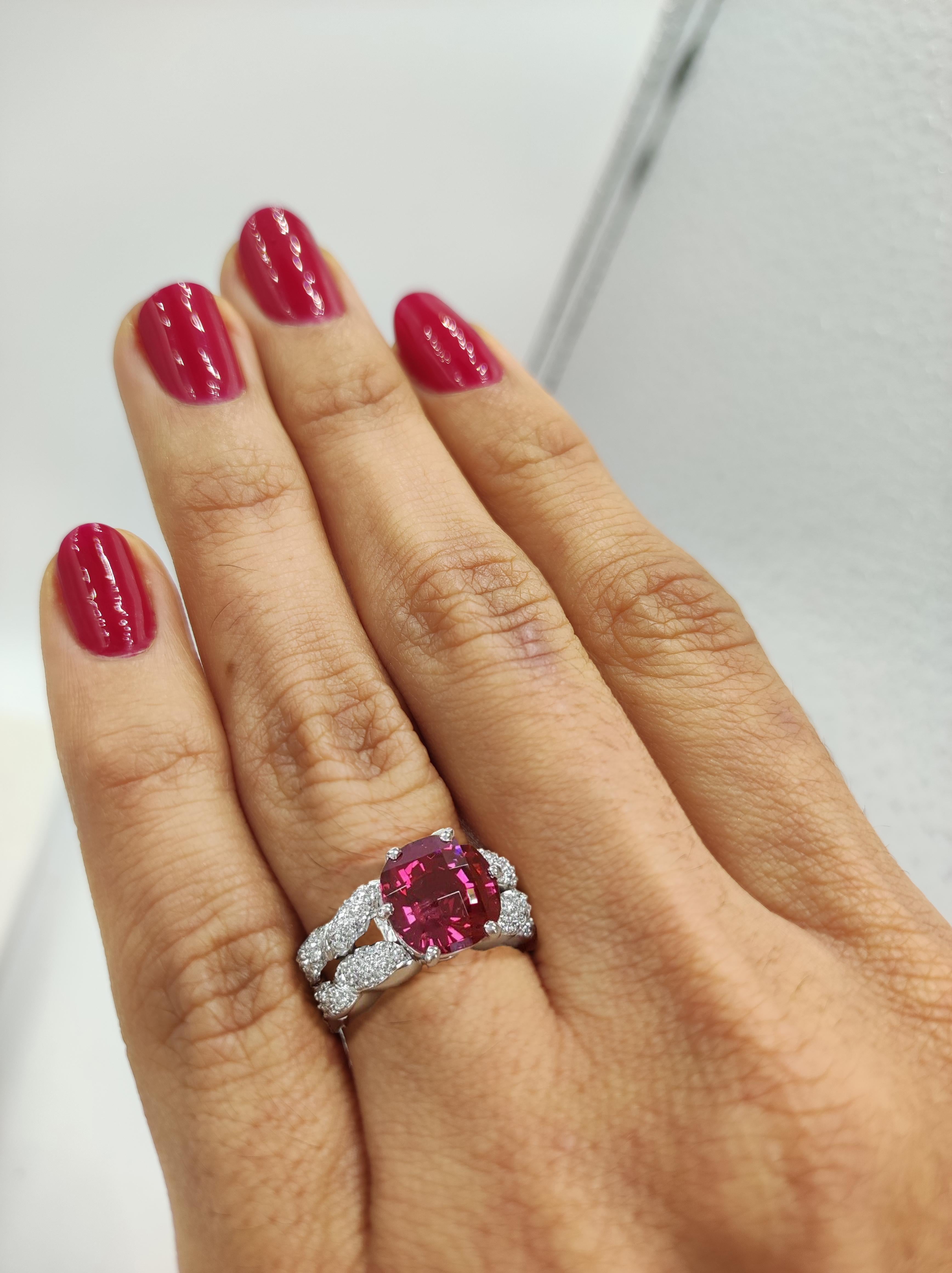 The ring weighs 16.6 grams, size 5.5, the center is a Natural Cushion Mixed Checkerboard Cut Red Spinel without any treatment or enhancement, weighing approximately 4.5 ct based on the measurements. The Spinel has a vivid red color & looks very