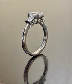 GIA Certified D Color SI1 0.90 Carat Emerald Cut Diamond Three Stone Engagement