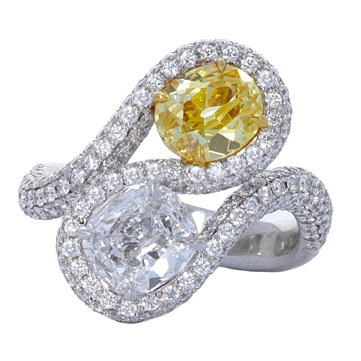 Contemporary GIA Fancy Intense Yellow and D Internally Flawless Diamond Bypass Ring