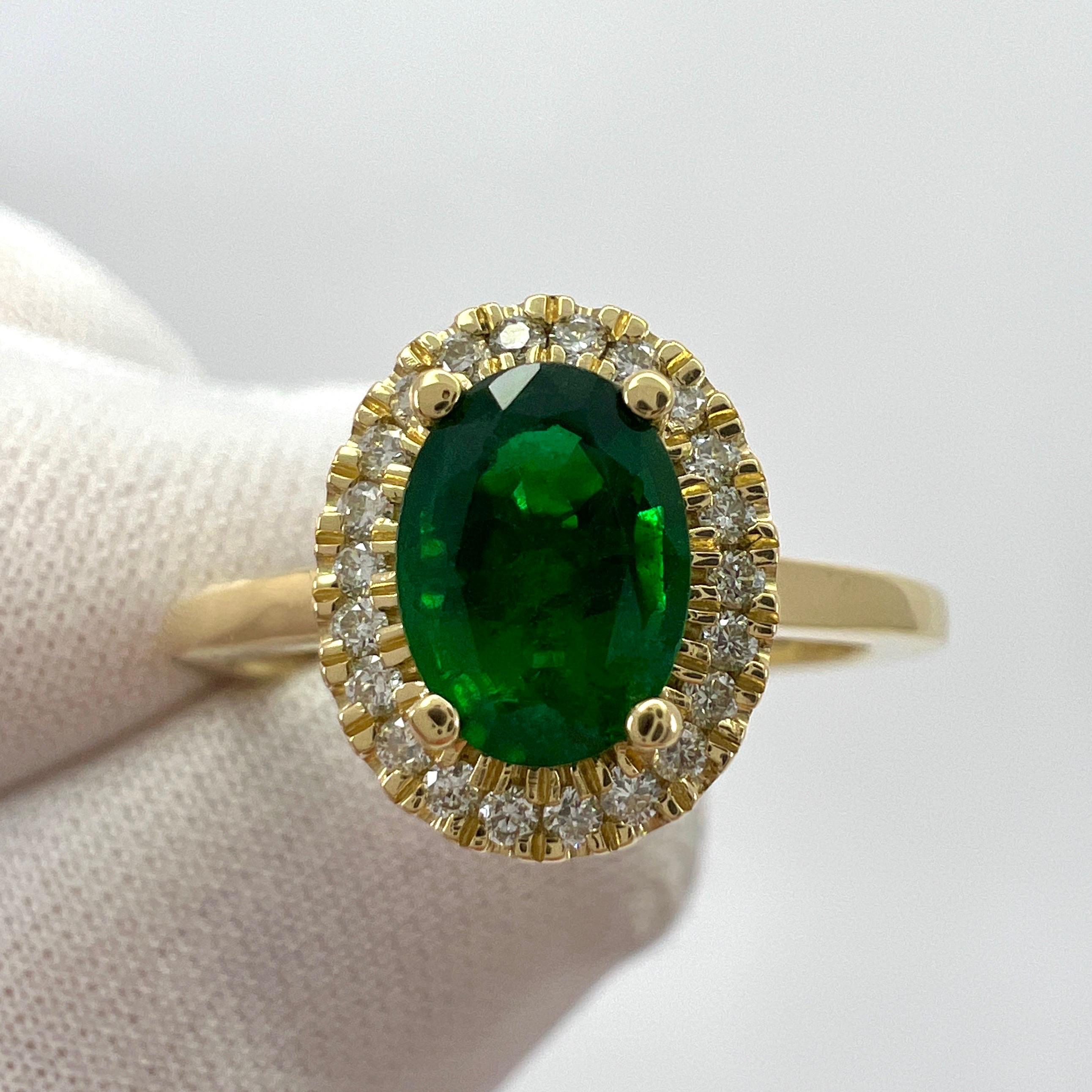Fine GIA Certified Deep Green Emerald And Diamond 18k Yellow Gold Halo Ring.

Fine 0.78 carat 7x5mm oval cut emerald with a top grade, intense green colour and very good clarity.
This stone has some small natural inclusions visible when looking
