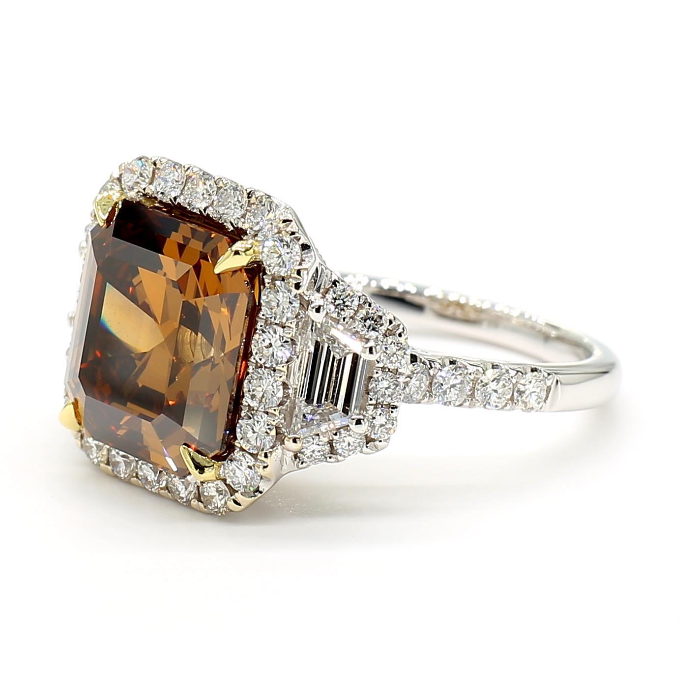 RareGemWorld's beautiful diamond ring. Mounted in a beautiful 18K Yellow and White Gold setting with a natural emerald cut brown diamond. The brown diamond is surrounded by natural white trapezoid cut diamonds and round natural white diamond melee.