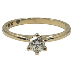 Bague solitaire en or 750 avec diamant certifié GIA 0,38 S-T/VS2 et monture à 6 griffes