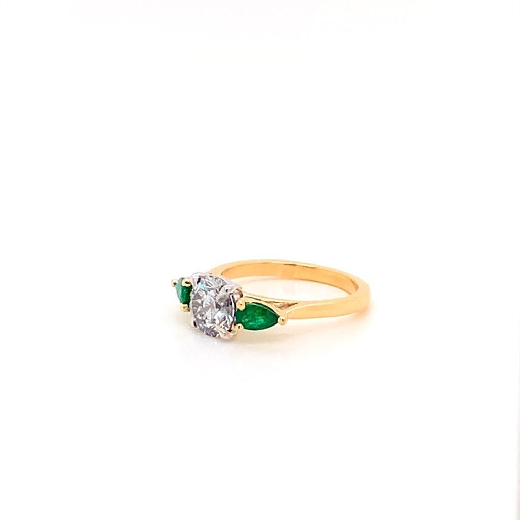 For Sale:  GIA Certified Diamond and Pear Shaped Emerald Ring in Yellow Gold and Platinum 4