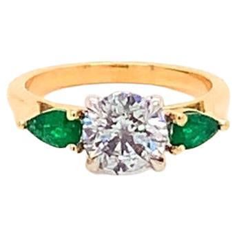 For Sale:  GIA Certified Diamond and Pear Shaped Emerald Ring in Yellow Gold and Platinum