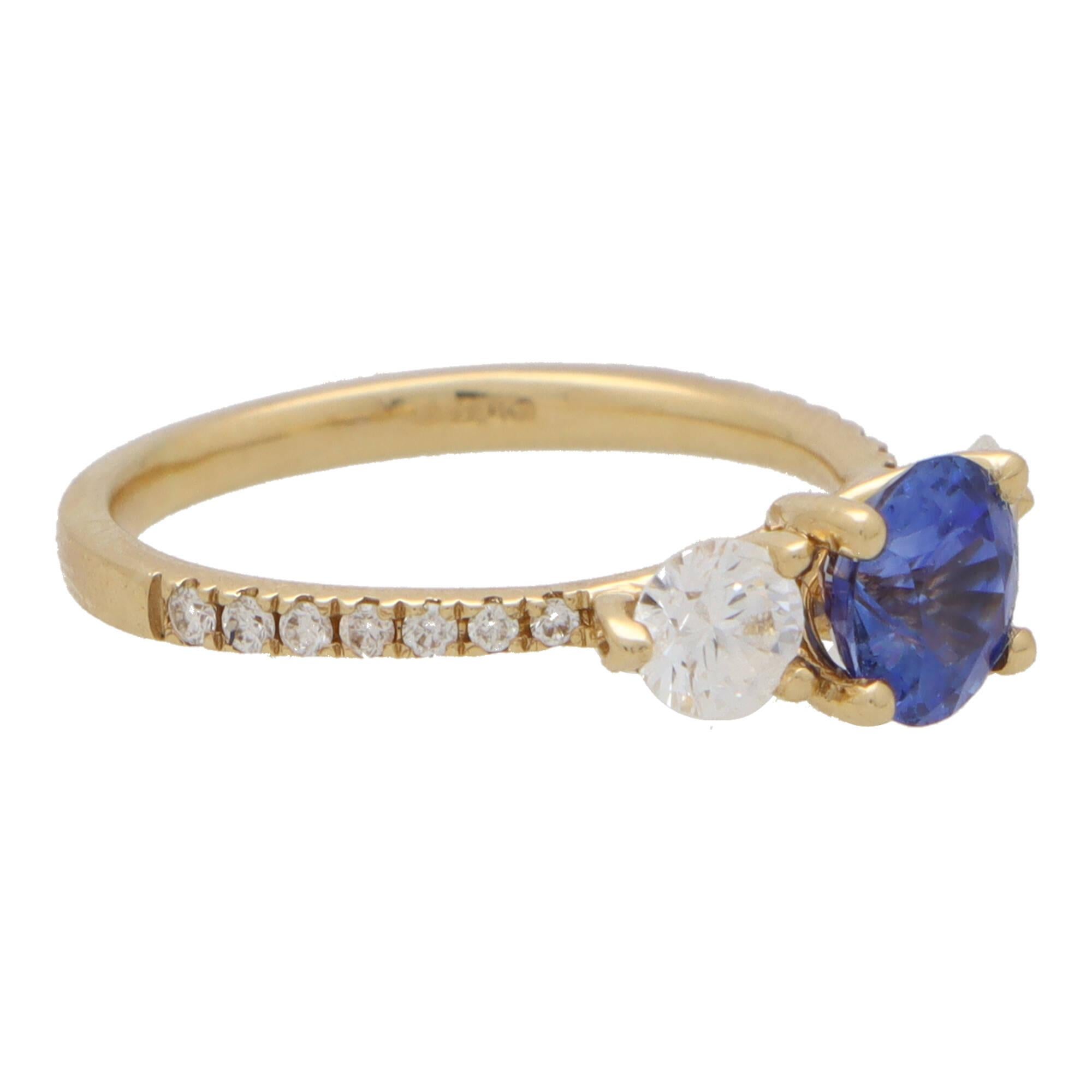 Round Cut GIA Certified Diamond and Sapphire Ring With Diamond Shoulders in Yellow Gold For Sale