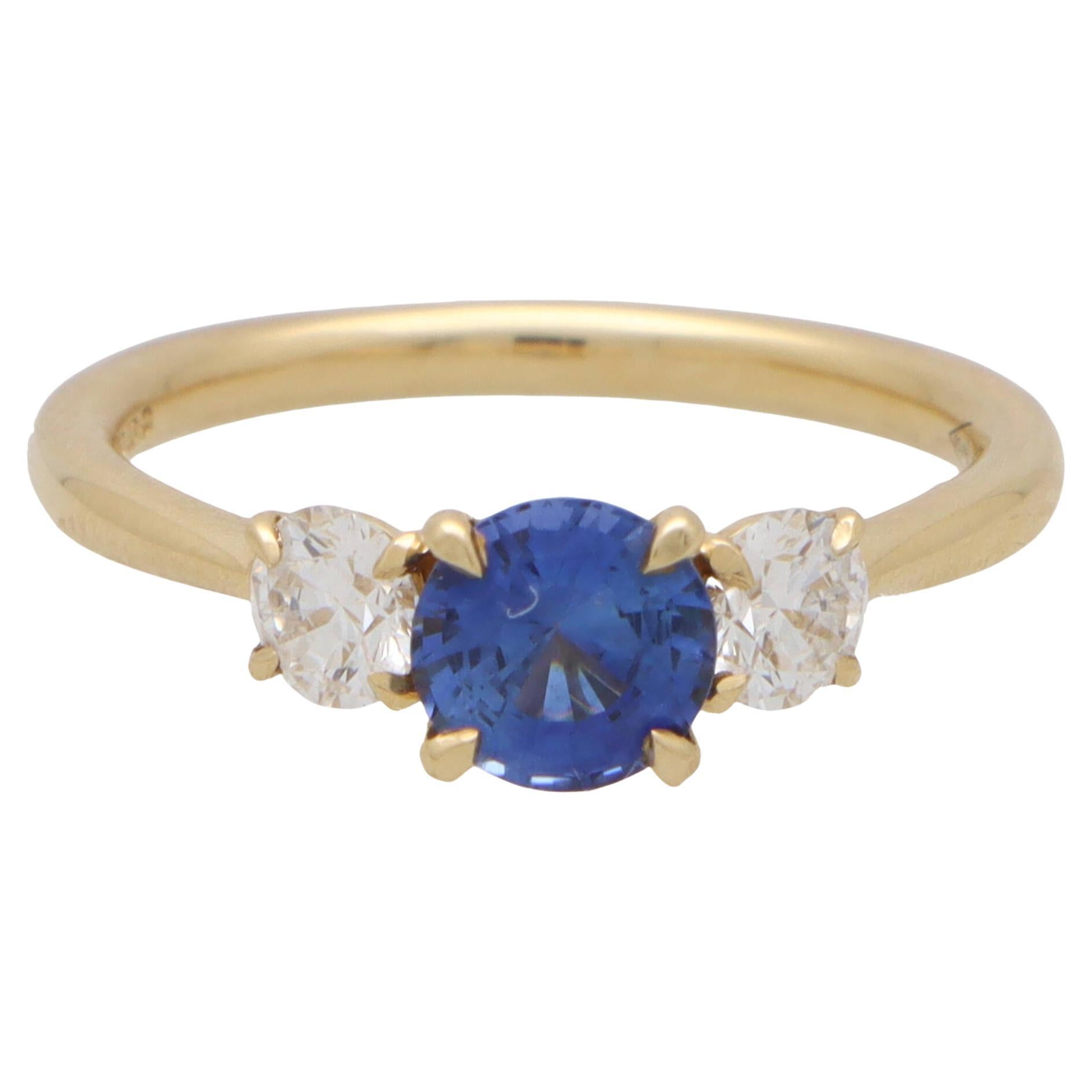 GIA Certified Diamond and Sapphire Three Stone Ring in 18k Yellow Gold For Sale