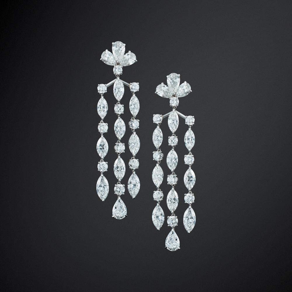 Spectacular platinum diamond chandelier earrings with the finest GIA certified diamonds.
Entirely handmade by one of New York's finest ateliers.
Total diamond weight 22.80 carats (19.18cts GIA certified pear shape & marquise + 3.62cts round)

Pear