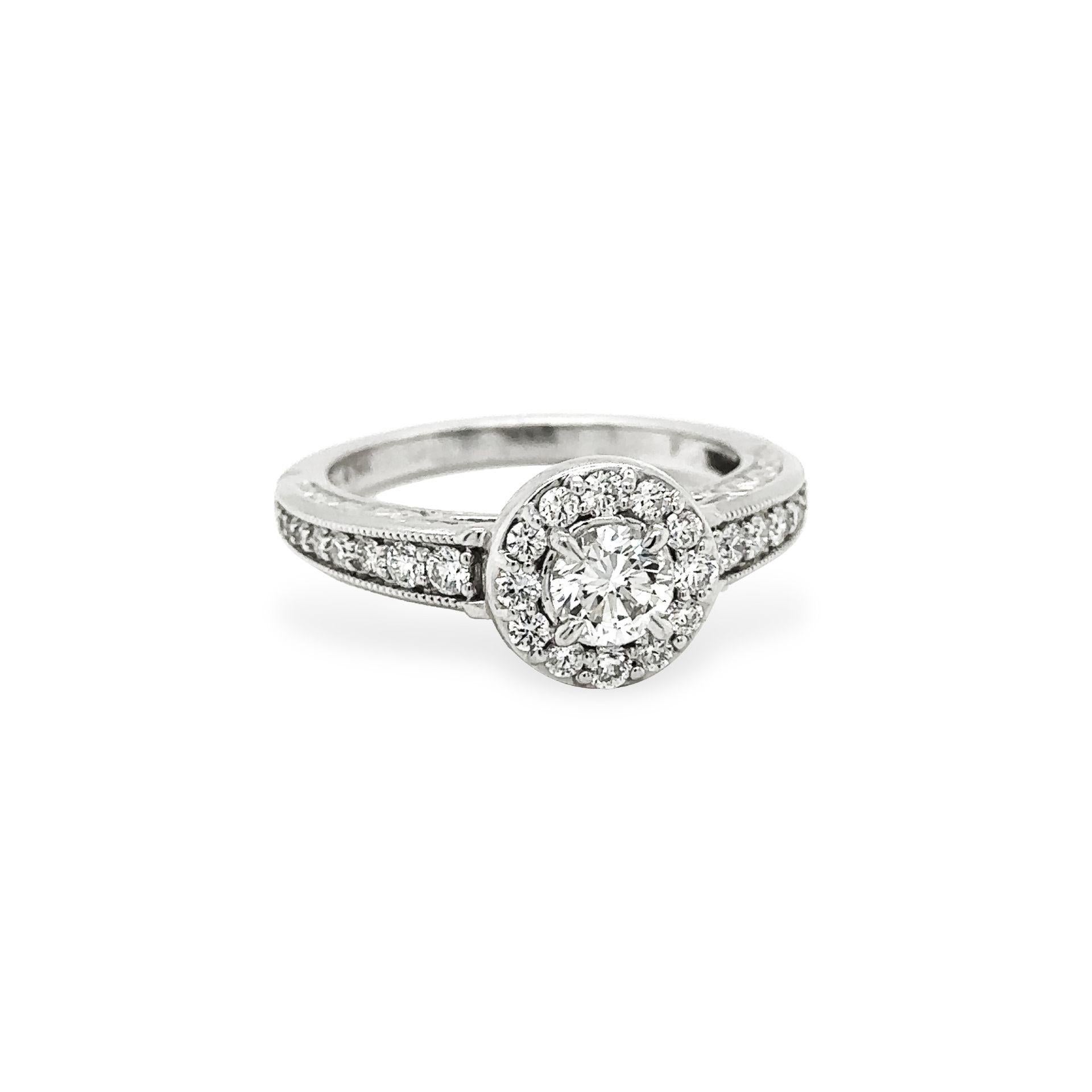 DIAMOND ENGAGEMENT RING 0.93 CARAT TOTAL WEIGHT SET IN 14KWG G VVS1 GIA

Round Diamond Center Stone 0.43 carats 
 
