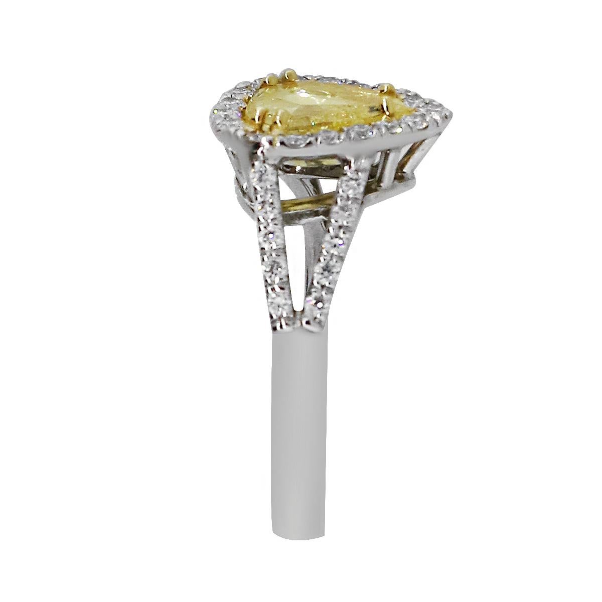 Material: 18k White Gold and Platinum
Center Diamond Details: Approximately 1ctw pear shape fancy yellow diamond. Center diamond is I1 in color and NFIY in clarity.
GIA Certificate: #2191289681
Accent Diamond Details: Approximately 0.54ctw round