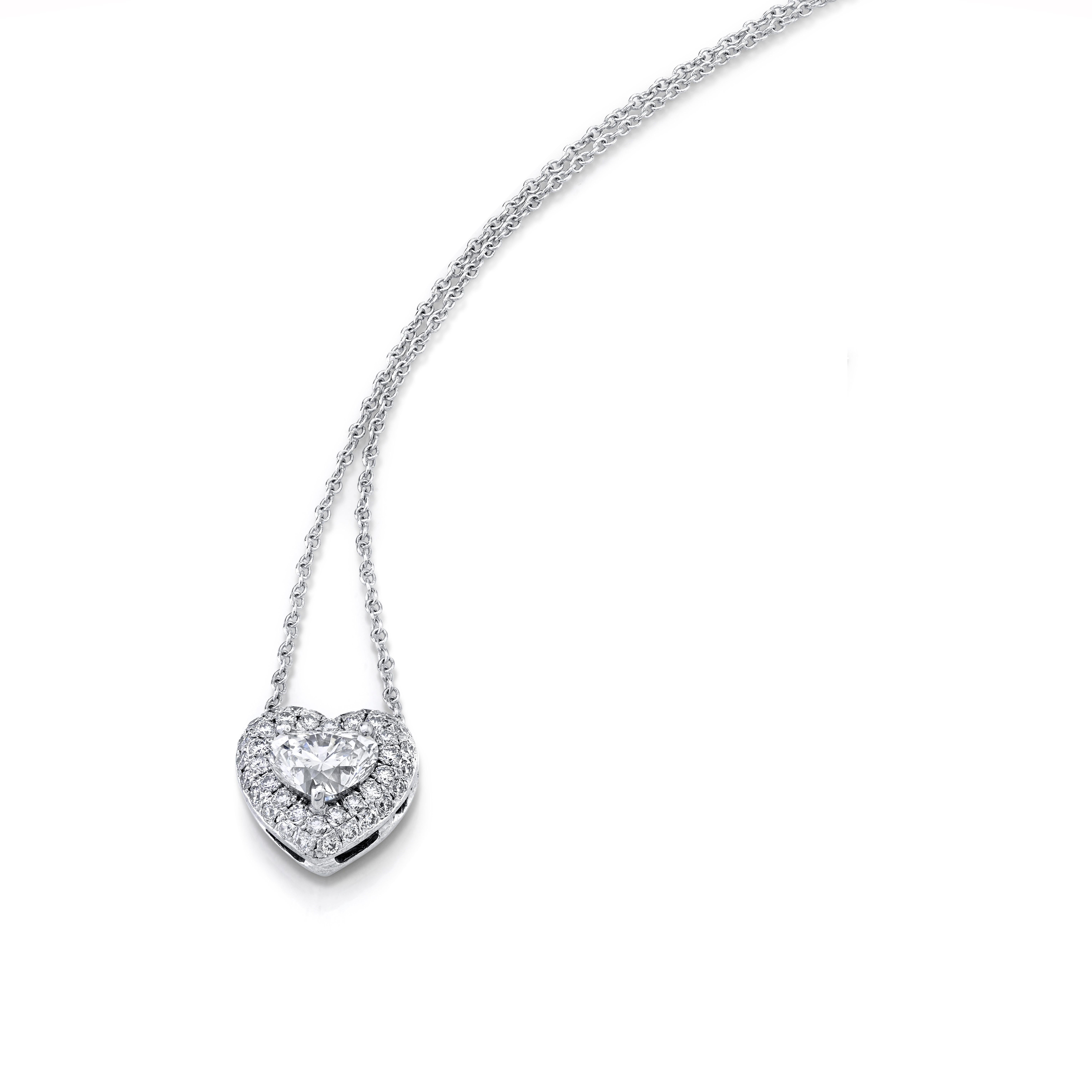 GIA CERTIFIED DIAMOND HEART SHAPE PENDANT  SET IN 18KWG

Heart Shape Diamond 0.90 carat. 

F Color VSI Clarity

With GIA Certificate

Micro-pave round Diamonds 0.45 carats

D/E Color VVS/VS Clarity

Total Weight 1.35 carats

Set in 18KWG. With 16