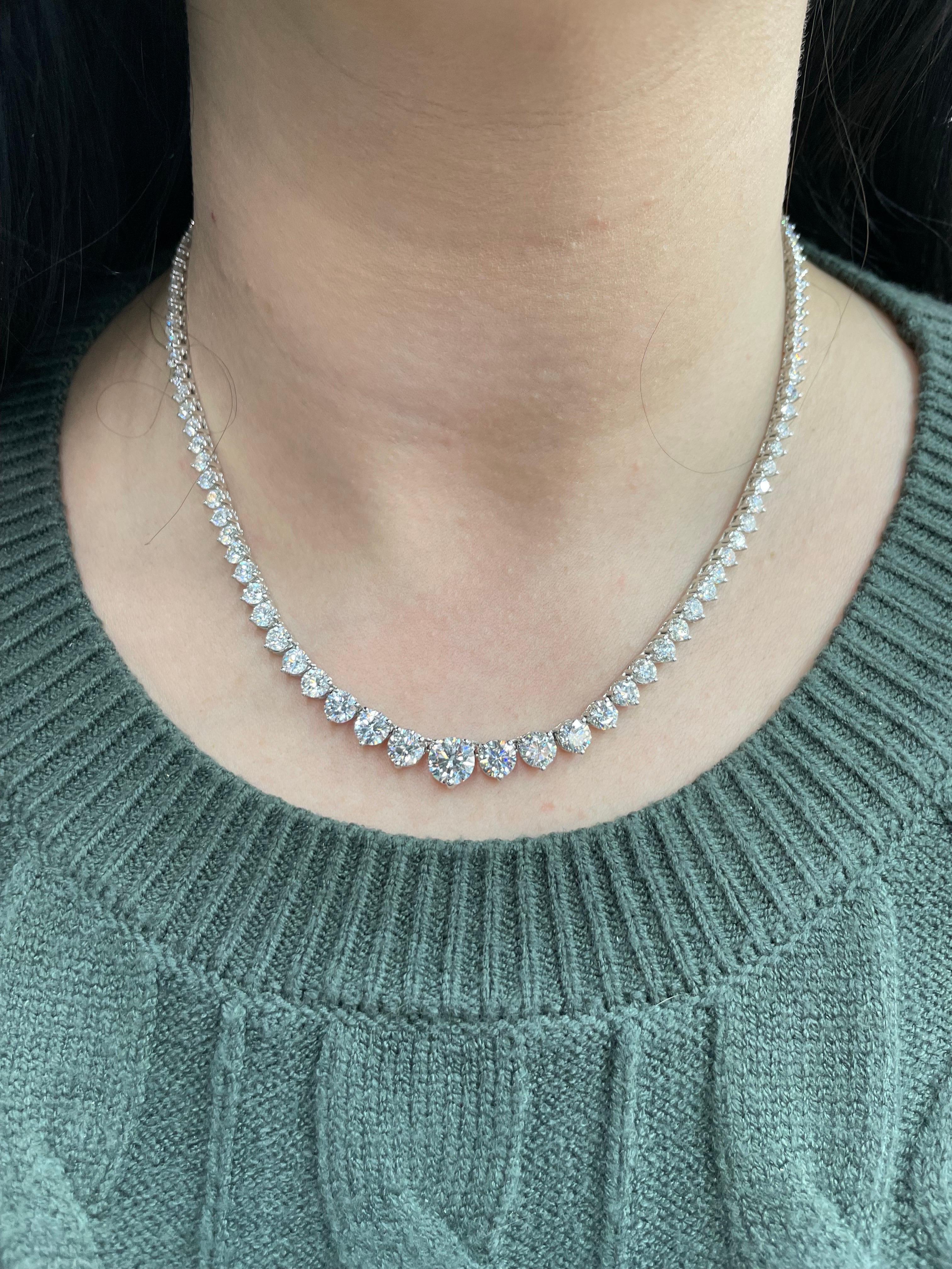 GIA Certified Diamond Riviere necklace featuring 109 Round Brilliants weighing 17 Carats, in a 3 prong 14 Karat White Gold.
Center Diamond 1.51 Carats GIA G SI2
Two Side Diamonds 0.72 Points GIA H SI2 & 0.66 Points GIA H SI2
Color G-H
Clarity