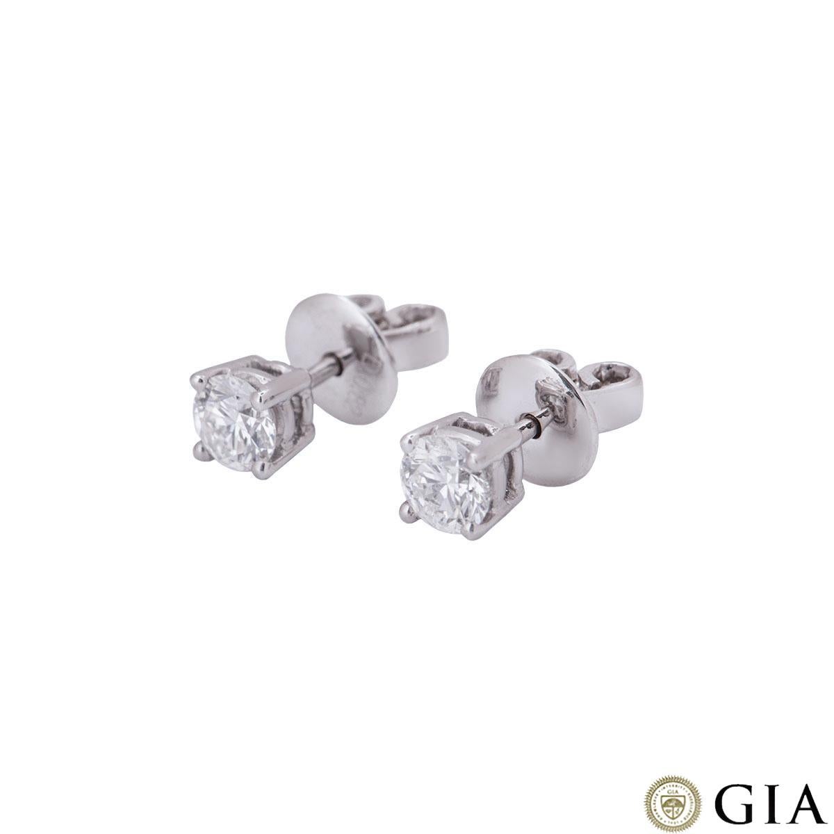 A beautiful pair of 18k white gold diamond stud earrings. The earrings comprise of a single round brilliant cut diamond in a four claw setting, each weighing 0.41ct, both F colour and VS1 in clarity. The earrings feature post and butterfly push back