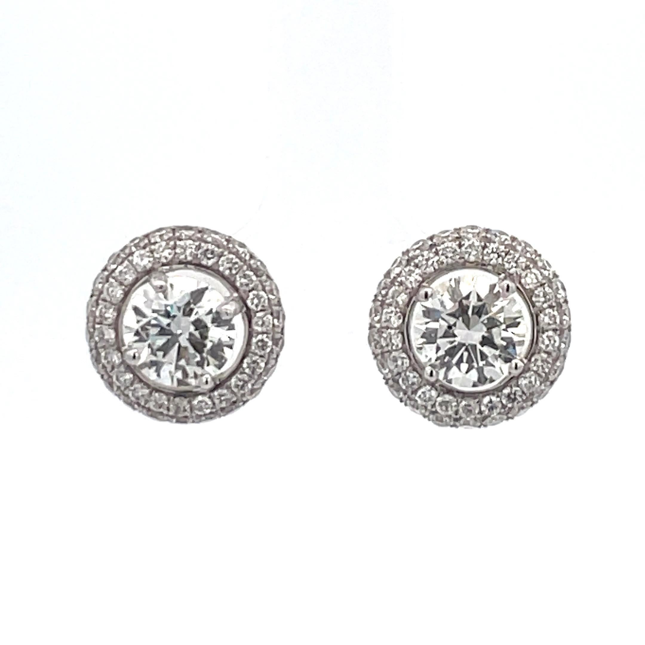 GIA Certified Diamond stud earrings weighing 2.01 Carats, in 18 Karat White Gold 4 Prong Basket Setting.
Halo mounting is attached, it can be removed.
Color J
Clarity SI1

Setting can be changed to a Basket, Martini or Champagne/ 3 or 4 Prong/ 14 or