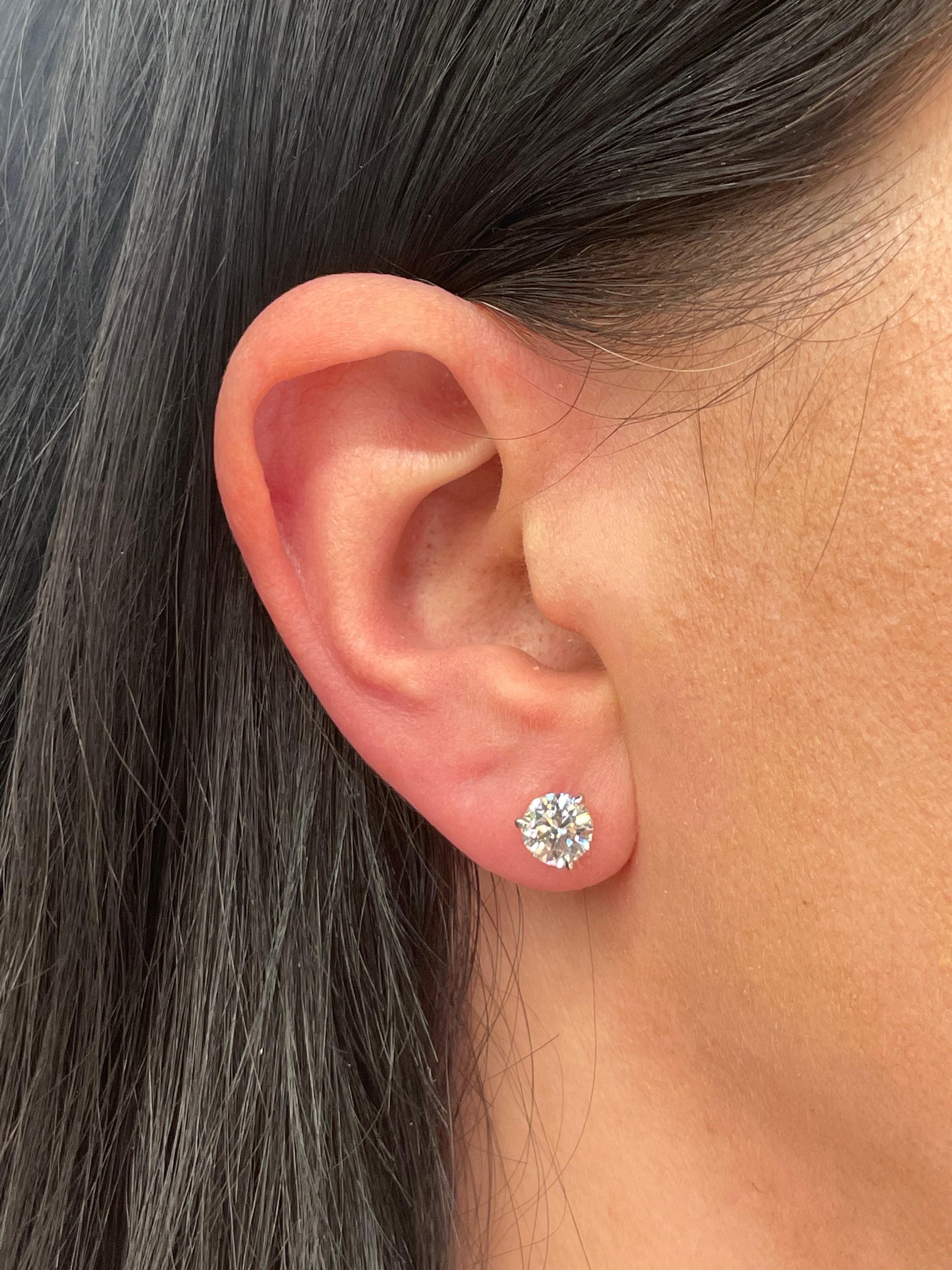 GIA Certified Diamond Stud earrings weighing 2.02 Carats, Color G-H, Clarity SI2, in a 18 Karat White Gold Champagne Setting.
Full of Life, Beautiful Pair!

Setting can be changed to a Basket, Martini or Champagne/ 3 or 4 Prong/ 14 or 18 Karat.

DM