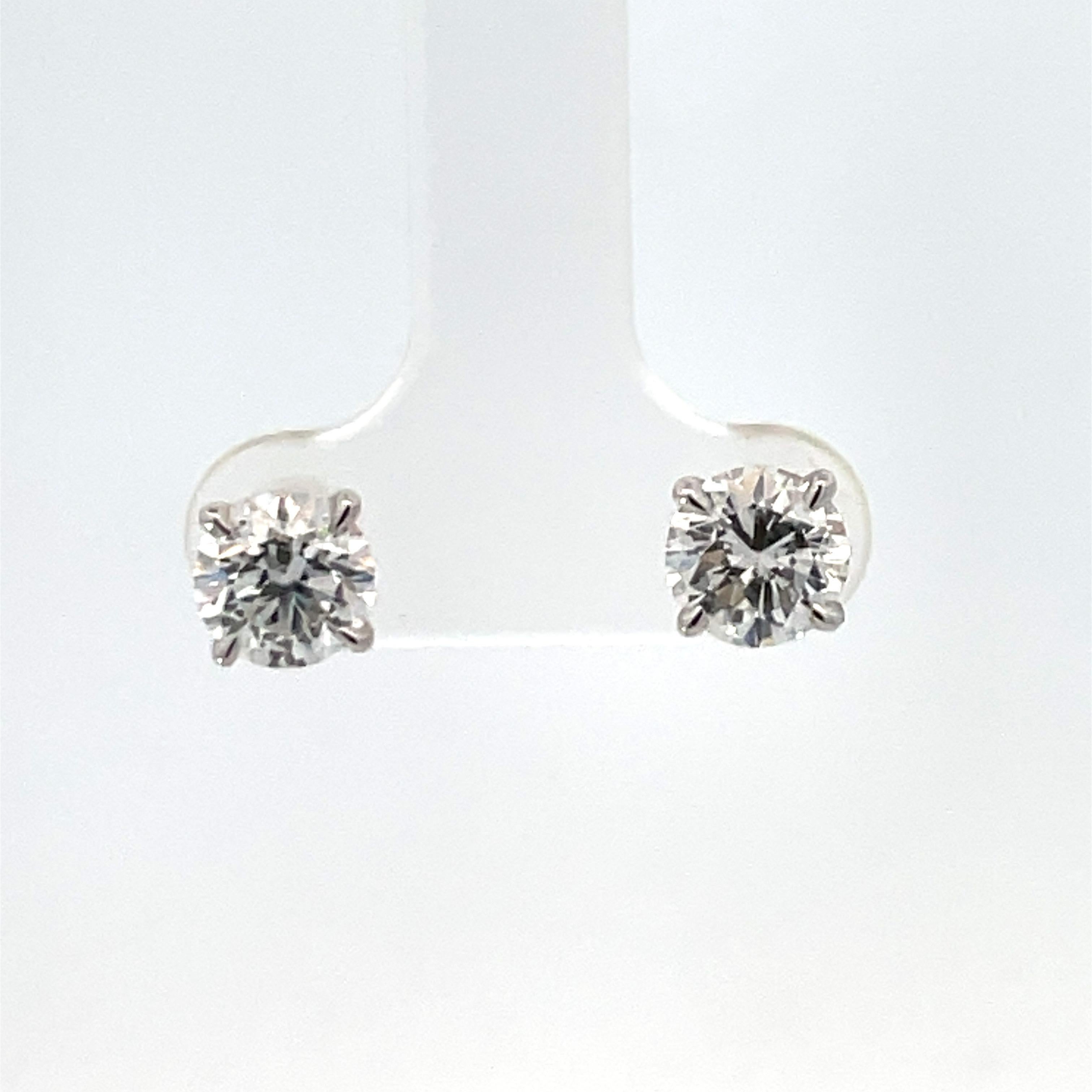 GIA CERTIFIED Diamond Stud Earrings 2.03 Carats D-E I1 18 Karat White Gold In New Condition In New York, NY