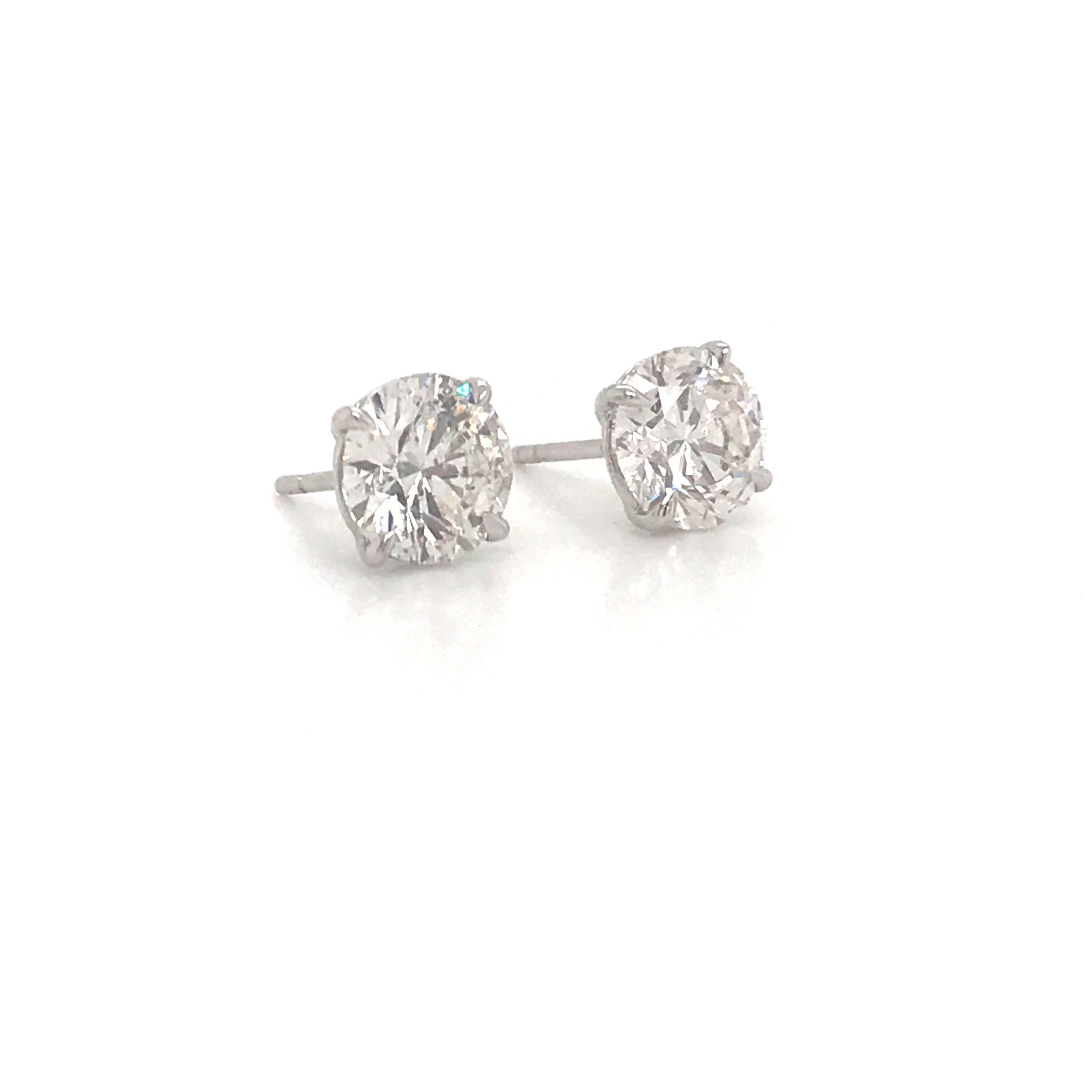 GIA Certified diamond stud earrings weighing 2.89 carats in a 4 prong champagne setting.
Color G-H
Clartiy I1-I2

Eye clean and full of brilliance. 
