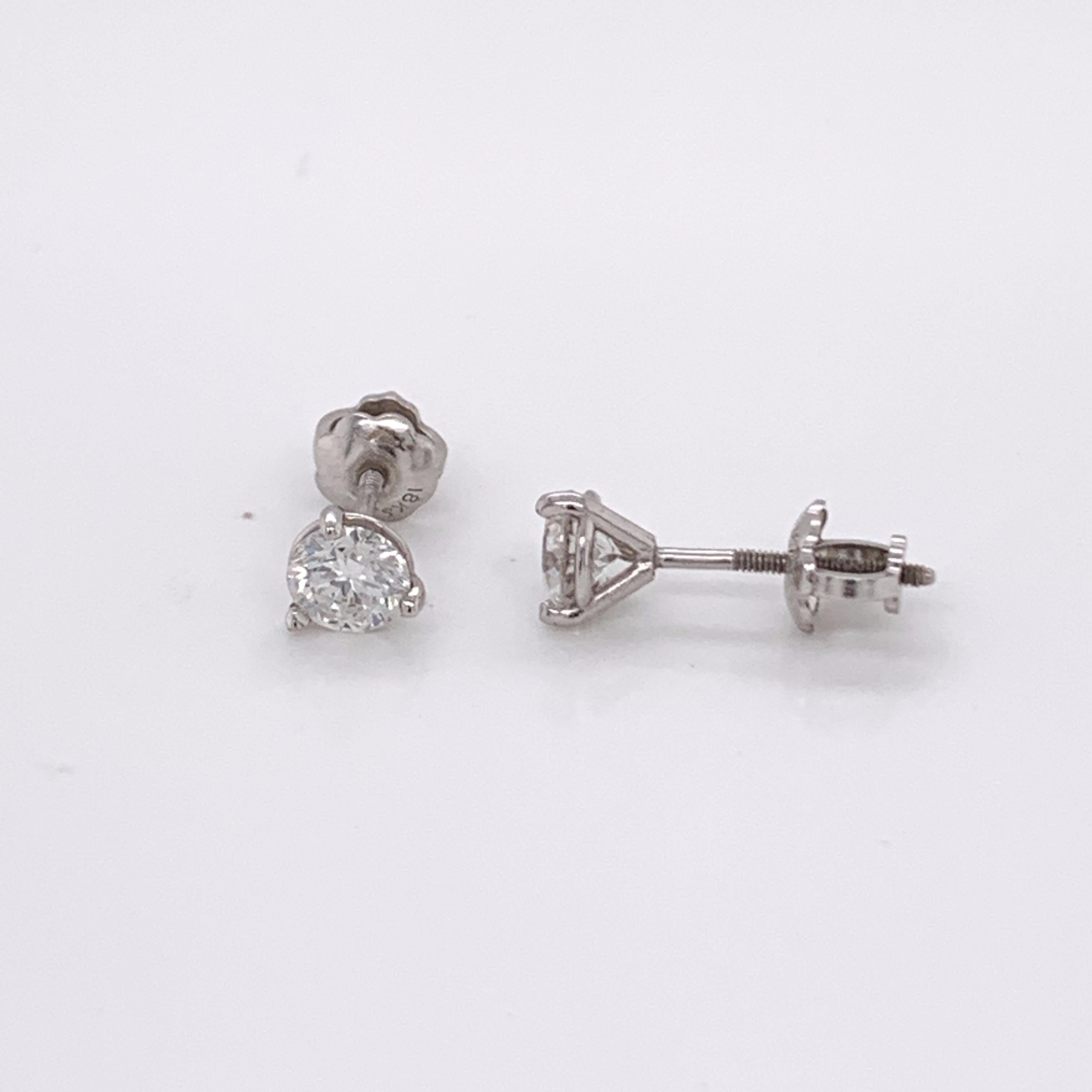 GIA Certified Diamond Stud Earrings made with real/natural brilliant cut diamonds. Total Diamond Weight: 0.80 carats. Diamond Quantity: 2 (round diamonds). Color: H-I. Clarity: SI2. Mounted on 18 karat white gold, screw-back setting.