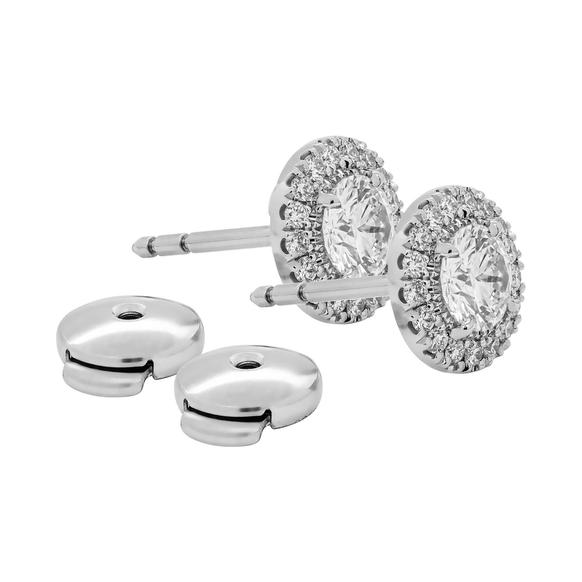 Round Cut GIA Certified Diamond Stud Earrings 0.60ct each For Sale
