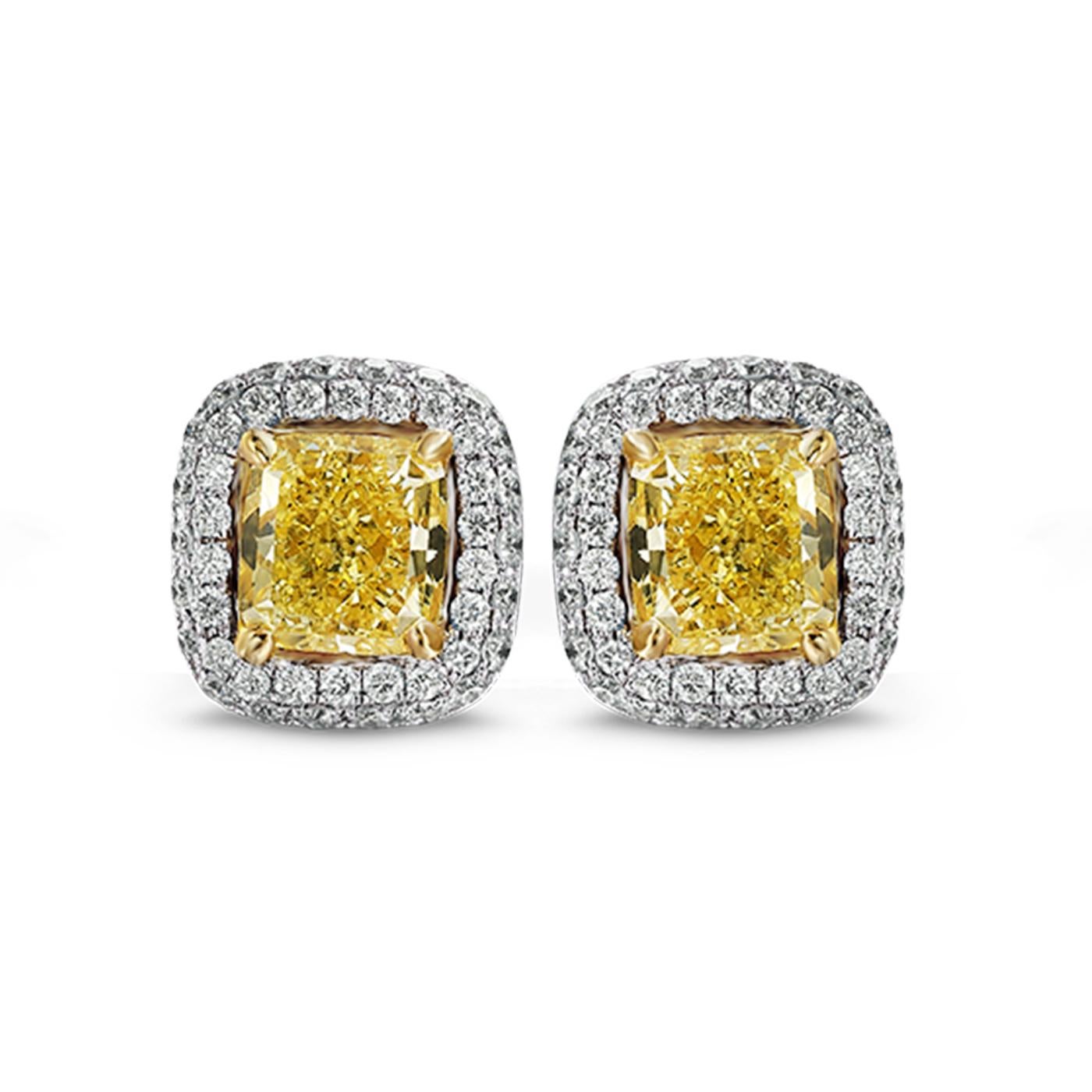 GIA Certified Diamond Studs 2.00 Carat VS, Canary Yellow, Cushion Cut, Halo 1 Ct

Perfect Yellow Color Diamonds for perfect gifts. 
Beautiful Canary Yellow Color with great Sparkle & Fire. 
Halo with Brilliant Cut Diamonds total 1.00ct. 
Total