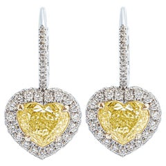 Boucles d'oreilles certifiées GIA avec des diamants jaunes fantaisie en forme de cœur