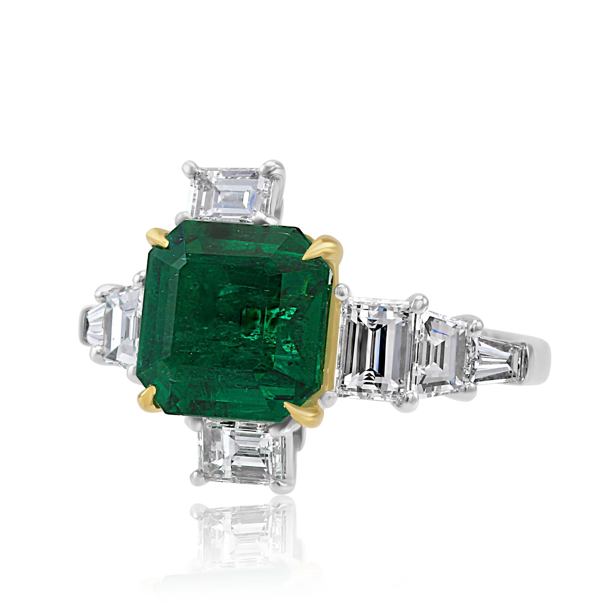 Stunning GIA Certified Emerald Square Emerald Cut 3.50 Carat Set with White G-H Color VS Clarity Mix Shapes Diamonds 1.50 Carat in one of a kind Contemporary  Hand Made asymmetrical Bridal Cocktail Fashion Ring in Plating and 18K Yellow Gold.

MADE