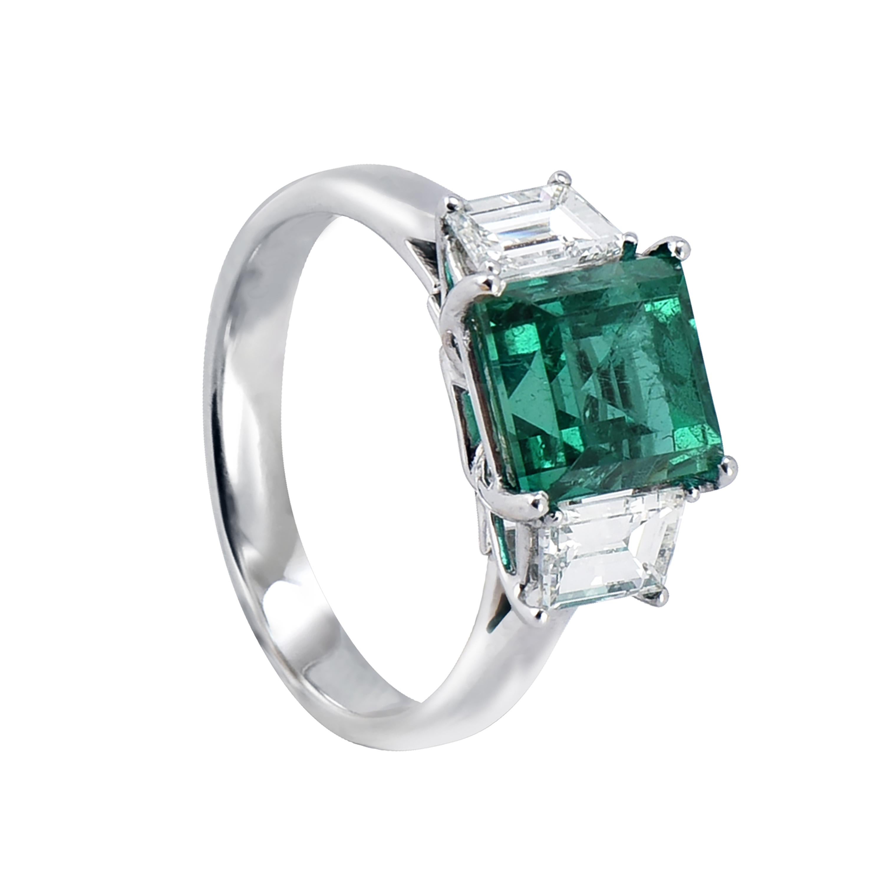 18 karat white gold emerald ring from the Princess collection of Laviere. The ring is set with a GIA certified 2.89 carats emerald and two white diamonds totaling 0.96 carats.
Gold Weight 4.25 grams. Diamond Clarity VS-SI. Diamond Colour G-H.
Ring