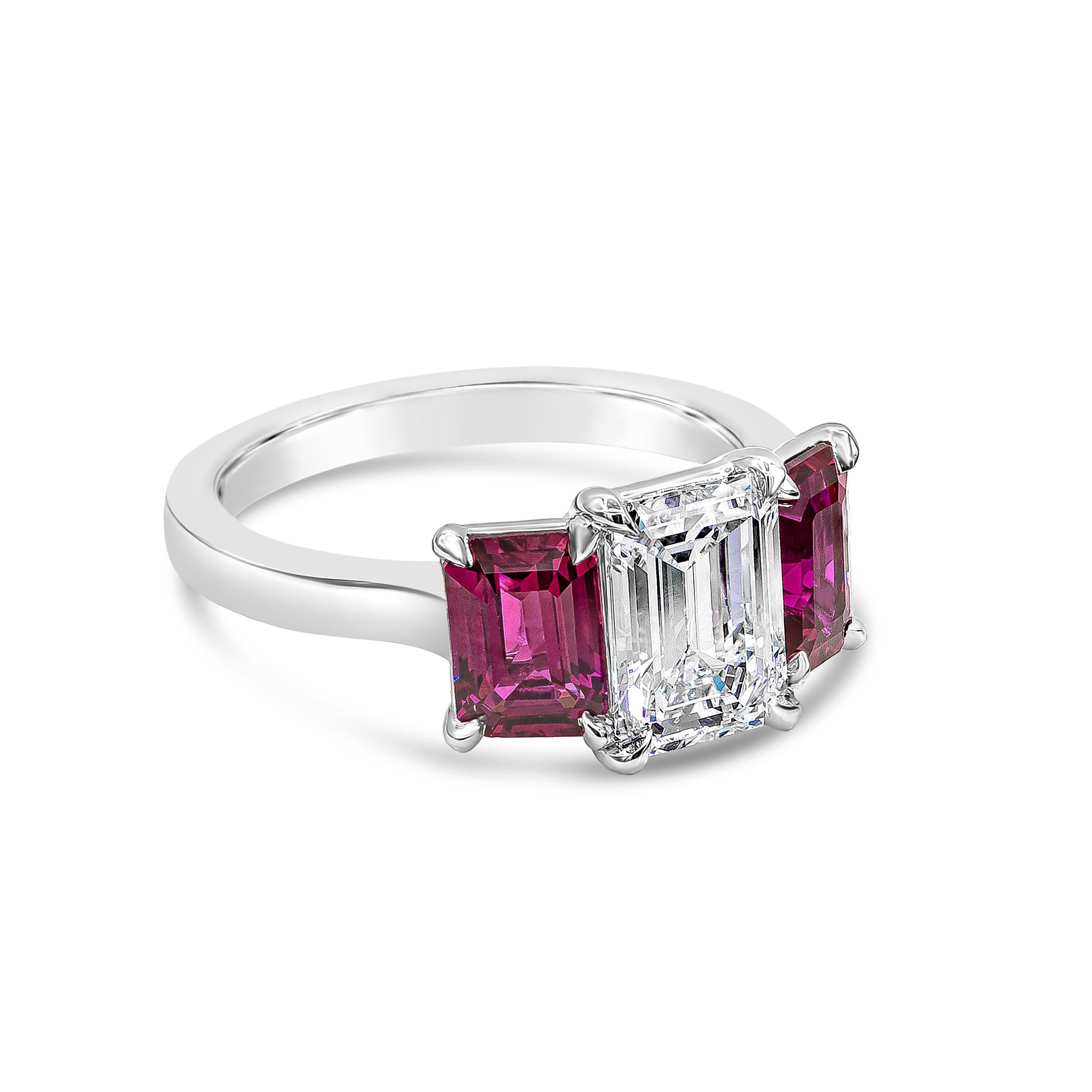 A gorgeous piece of jewelry showcasing a 1.62 carats emerald cut diamond certified by GIA as E color and VVS1 in clarity. Flanking the center diamond are two color-rich emerald cut rubies weighing 2.12 carats total, certified by GIA as Red color, NO
