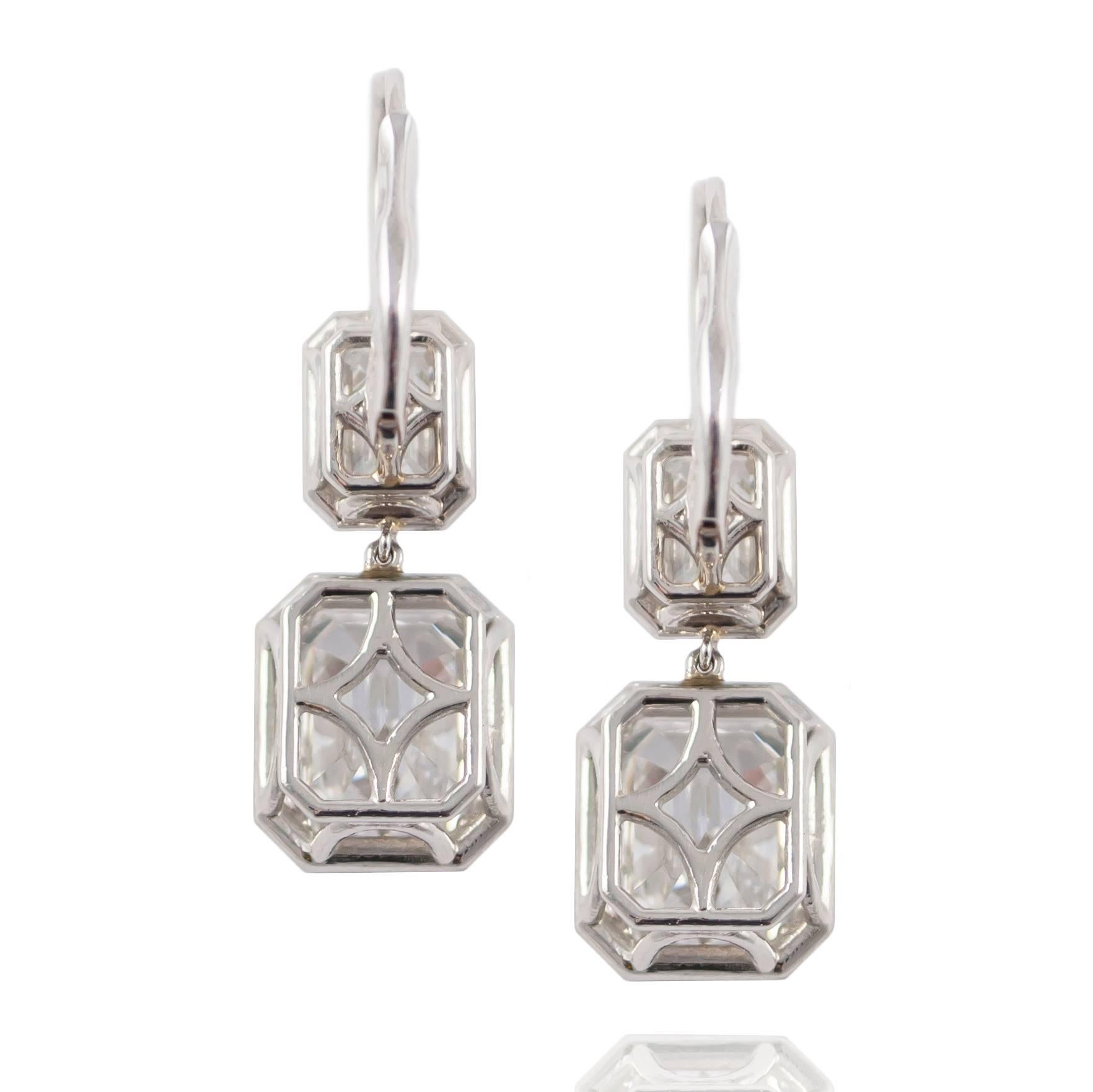 emerald cut diamond dangle earrings