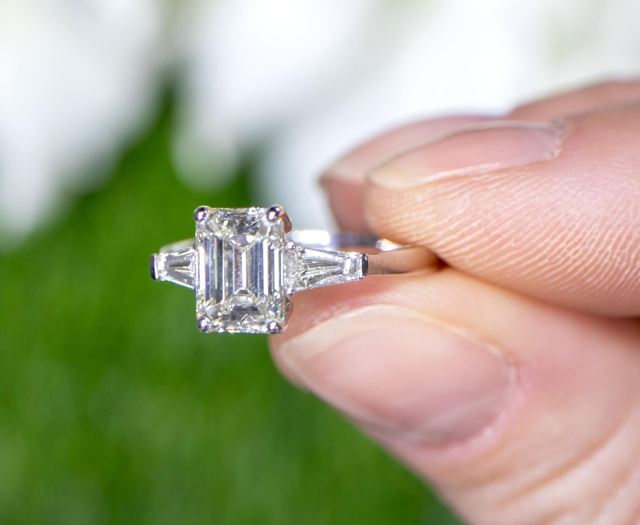 Contemporary GIA Certified Emerald Cut Diamond Engagement Ring 1.82 Carats 18K Gold For Sale