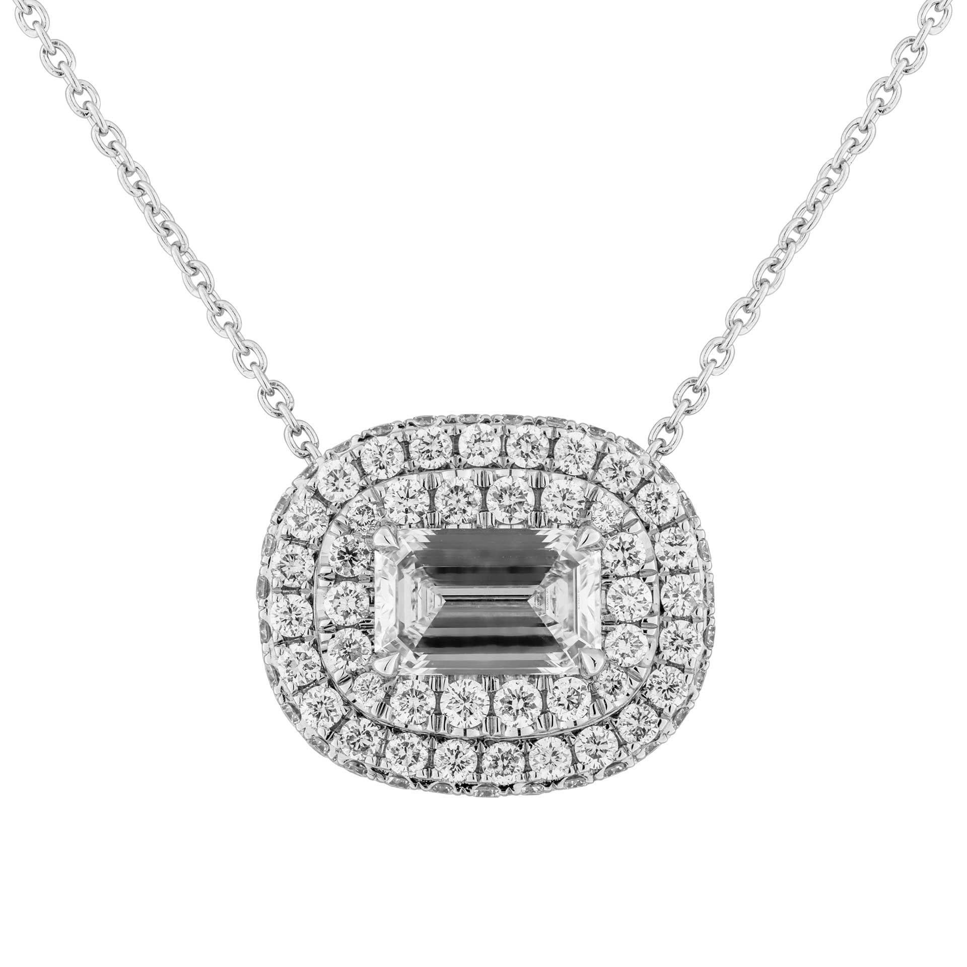 A timeless classic !
Beautiful Oval Diamond Pendant with 2 rows of white diamond halo around to highlight the beauty of the stone, totaling 0.55ct of full brilliant cut round diamonds mounted in Platinum950 

Center stone:  a 0.71ct H VVS1 Emerald