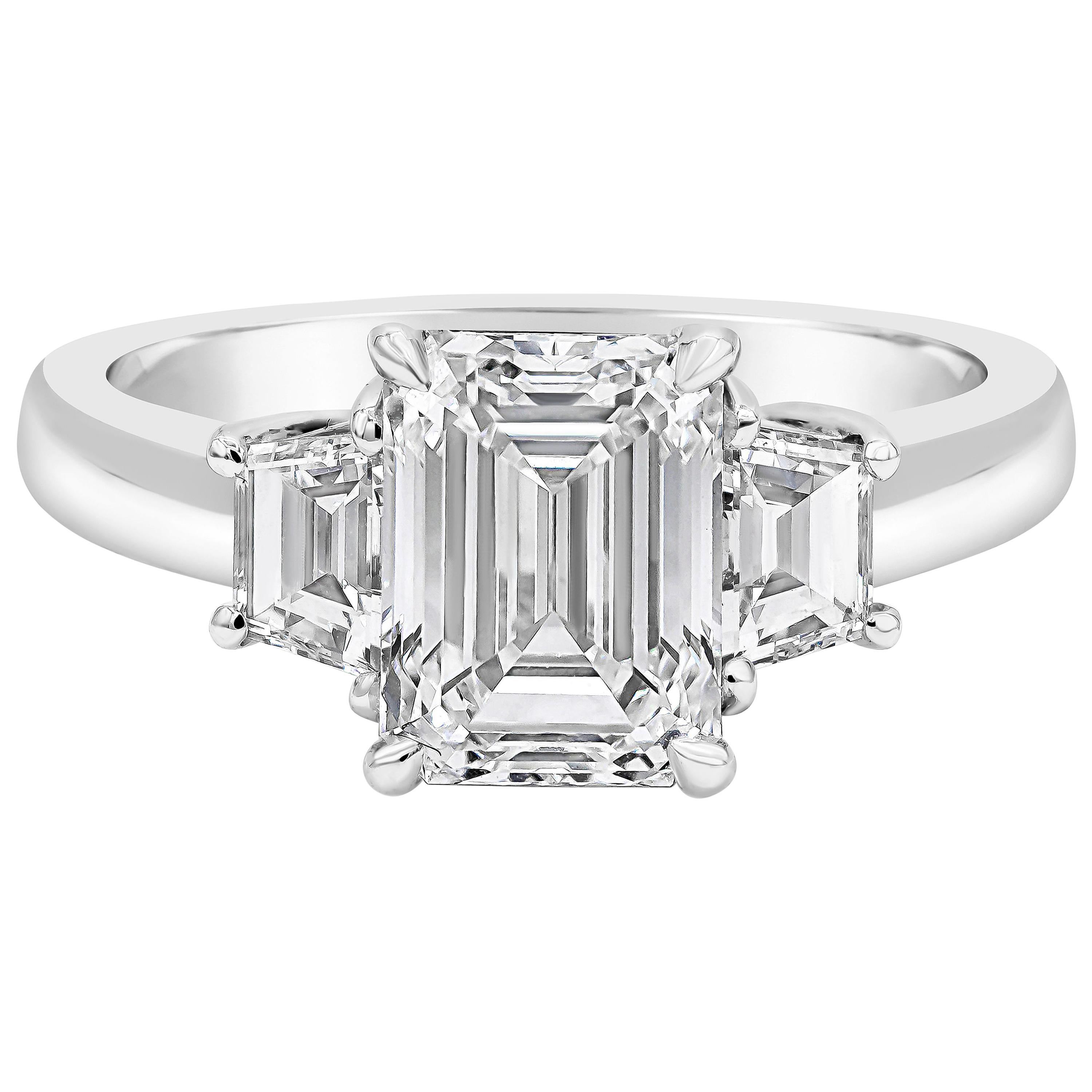 GIA Certified 2.12 Carats Emerald Cut Diamond Three Stone Engagement Ring For Sale