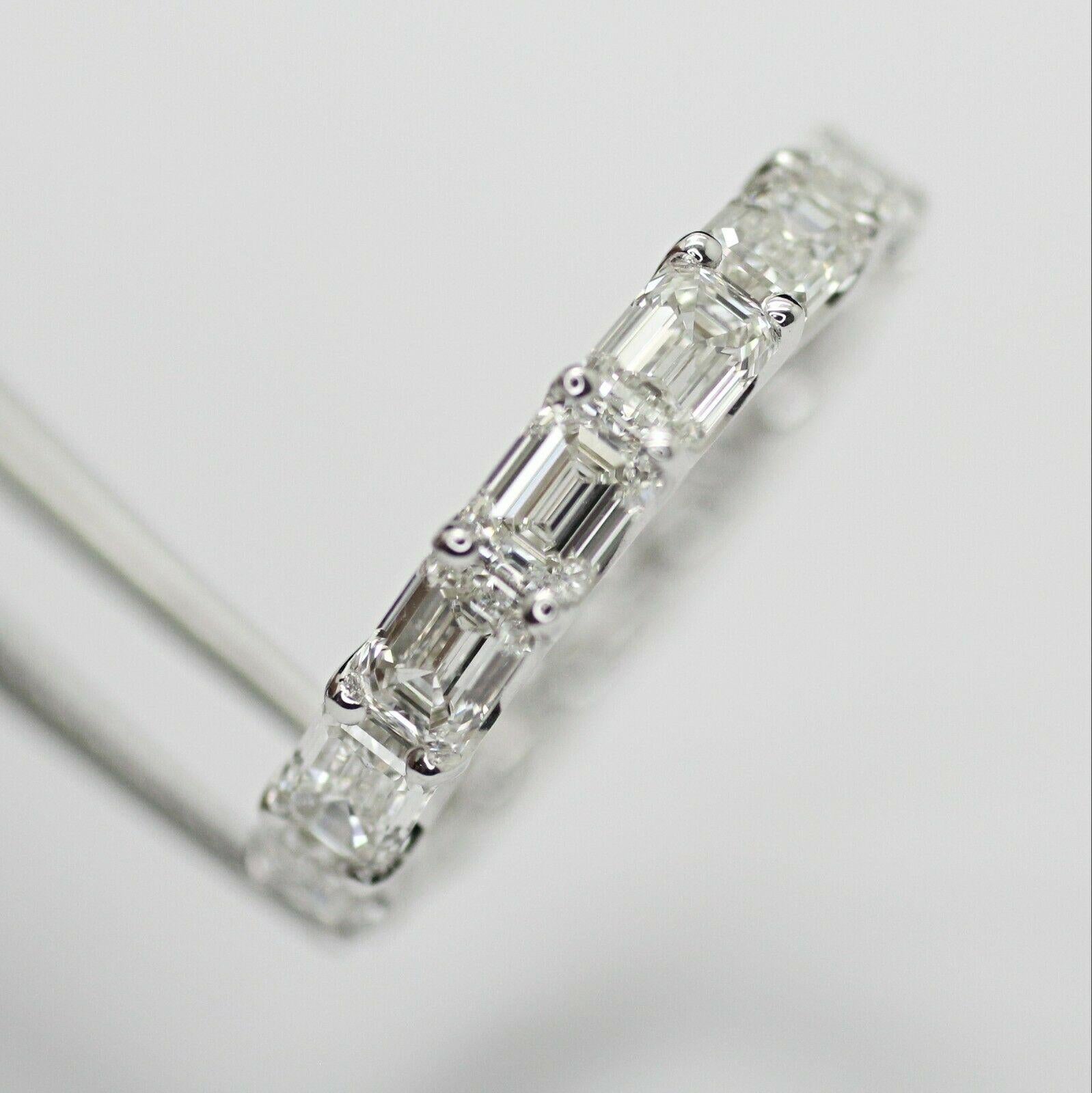  Specifications:
    main stone:GIA CERTIFIED  EMERALD CUT DIAMOND
    DIAMONDS: 15 PCS
    carat total weight: 4.56 CARAT TOTAL WEIGHT
    color: I
    clarity: VVS1-VS1    brand: NONE
    metal: 18K WHITE GOLD
    type: ETERNITY ring
    weight: 